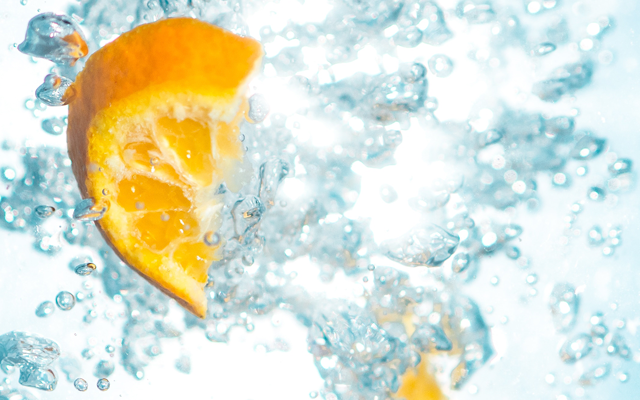Bubbles and orange wedges