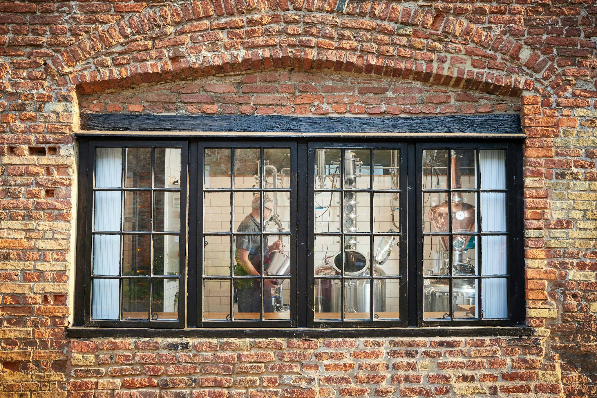 View through window of WhataHoot distillery