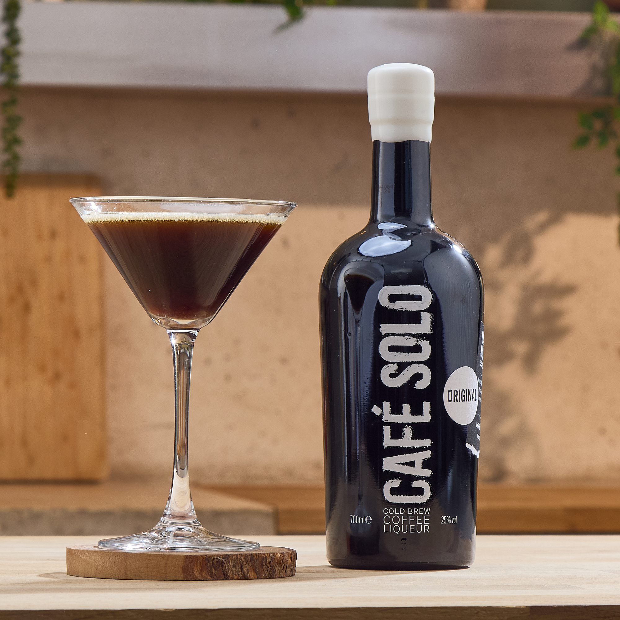 Bottle of cafe solo and cocktail