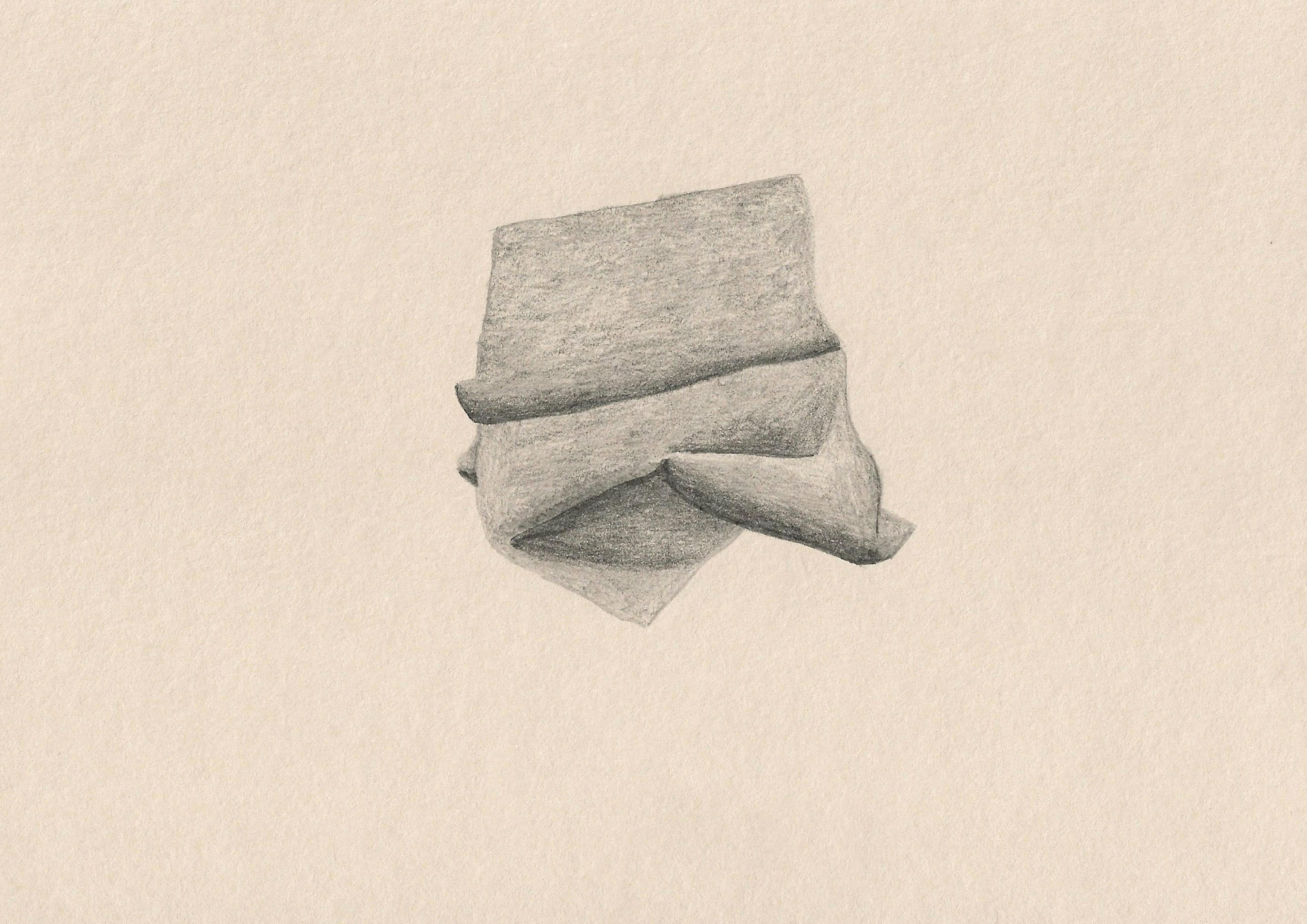 A pencil drawing on ivory coloured paper of a yoga mat crumpled up on the floor