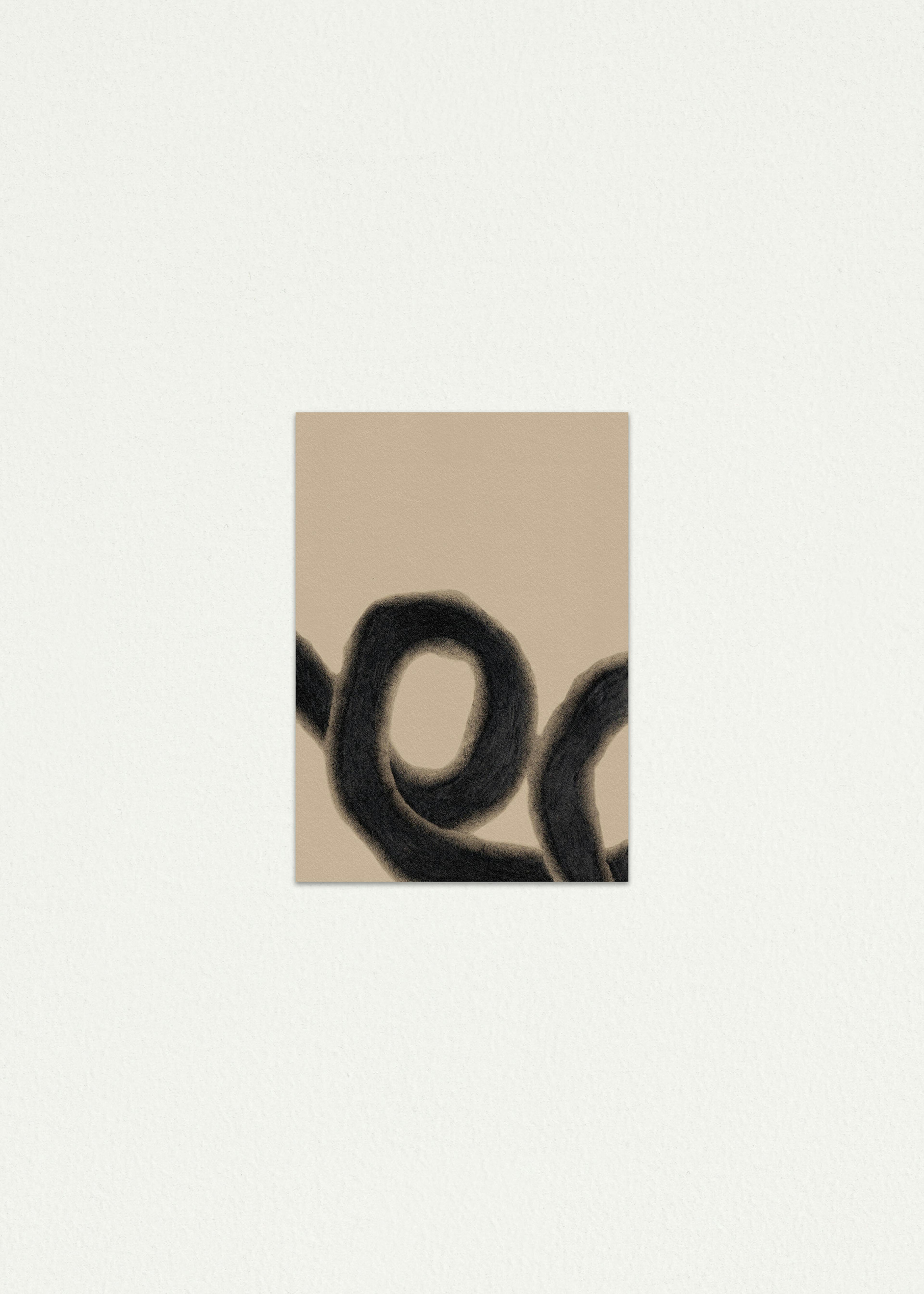 A graphite and pencil drawing on natural coloured paper of two loop shapes intertwining on a white wall background.