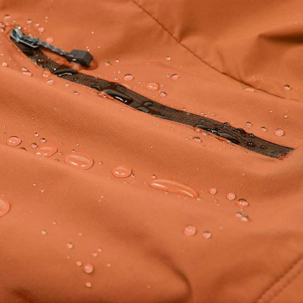 Orange jacket close-up with water beading