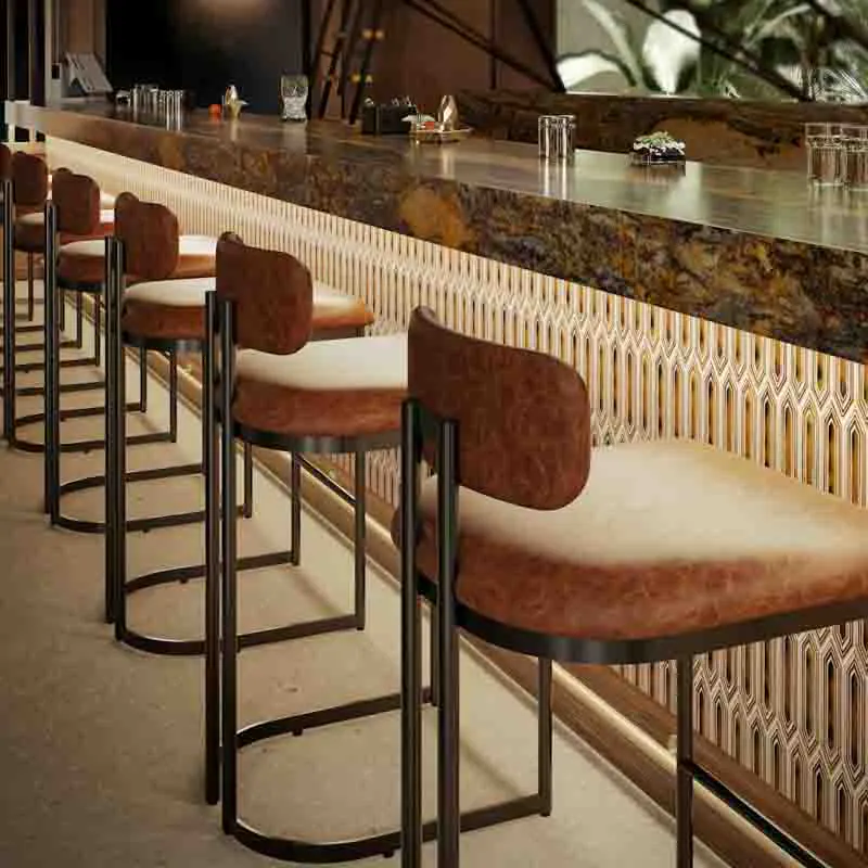 Custom barstools in modern hospitality lounge.