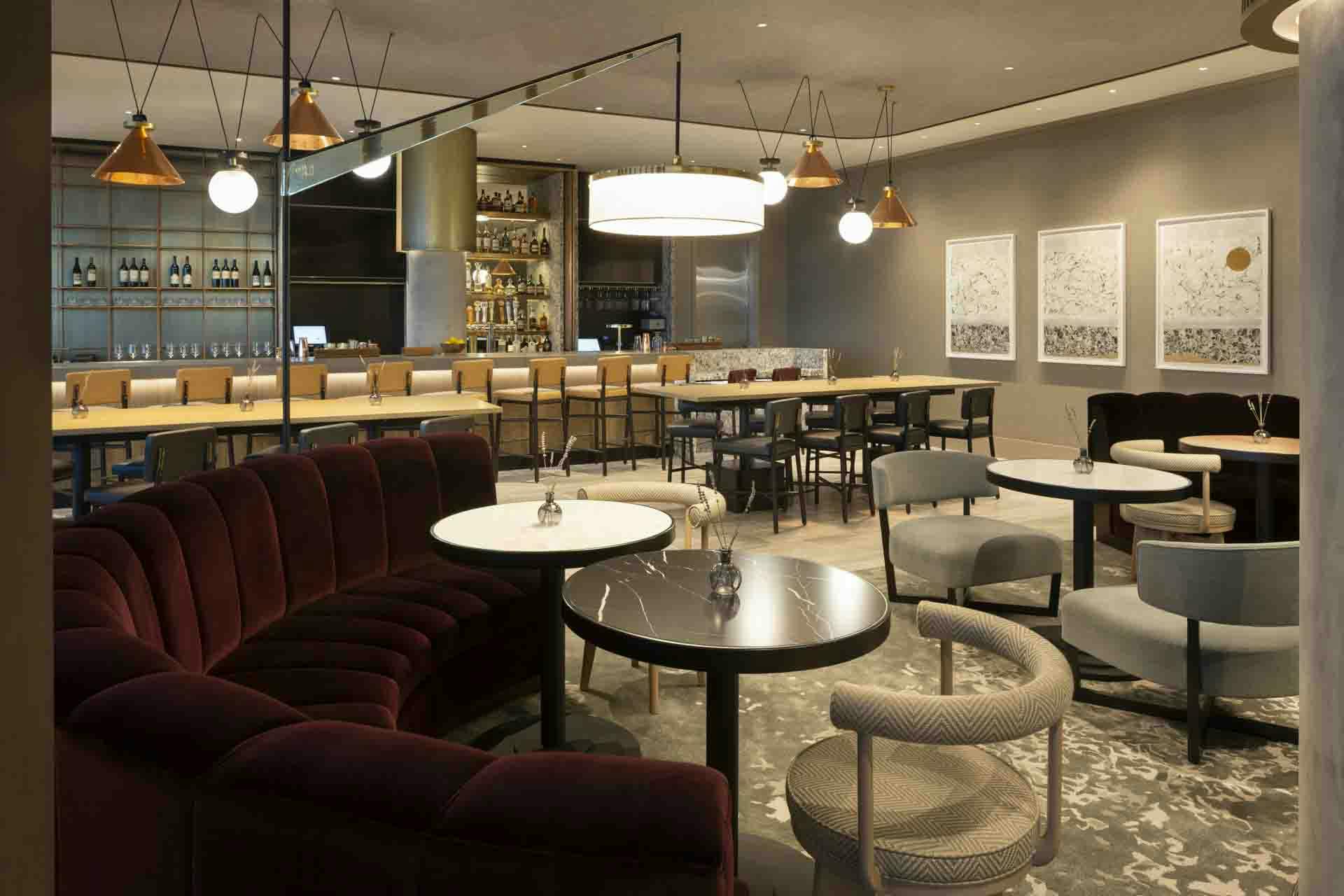 Custom hospitality dining furniture in stylish interior.