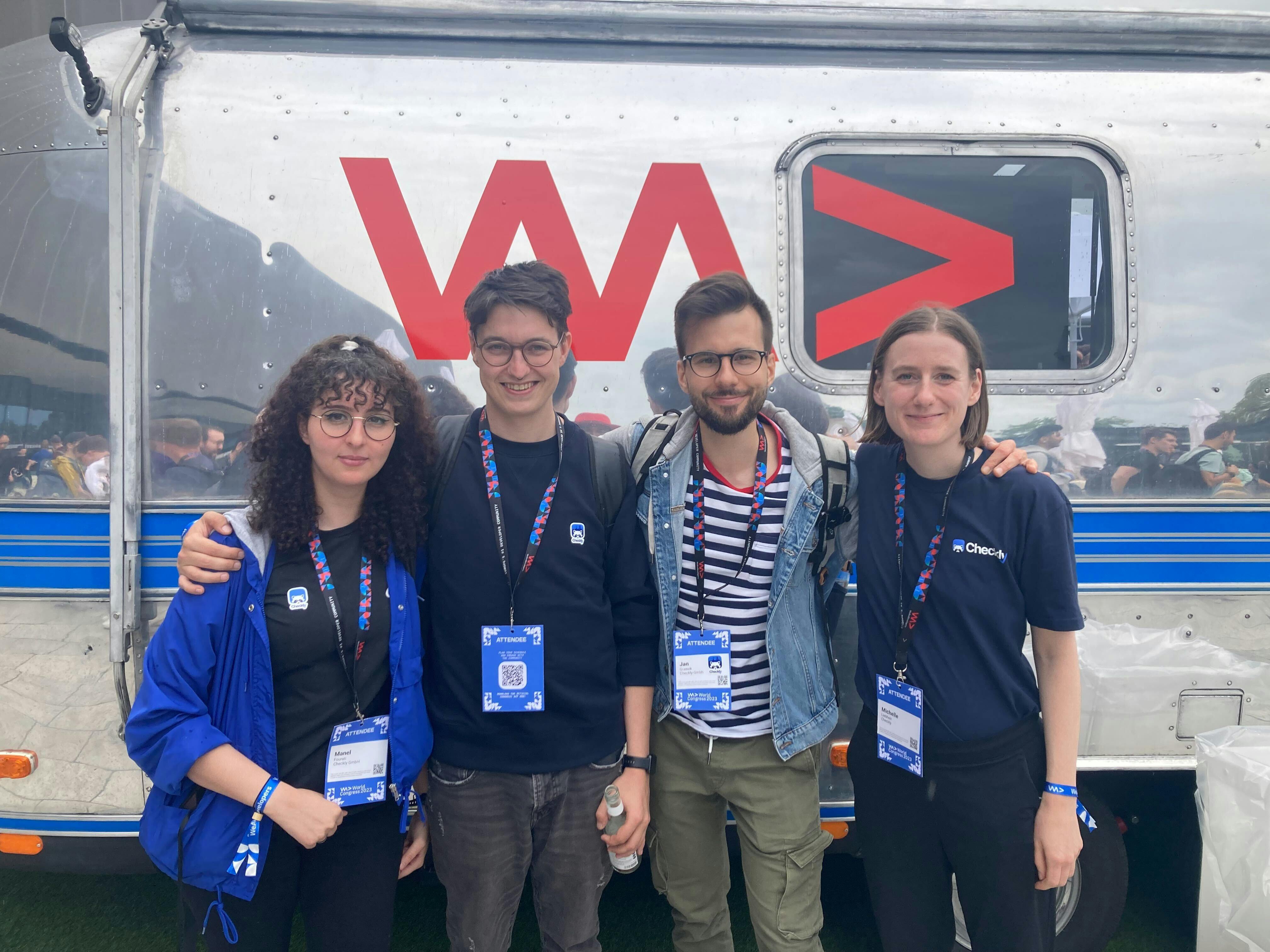 Photo of 4 Checkly team members at the WeAreDevelopers conference in Berlin