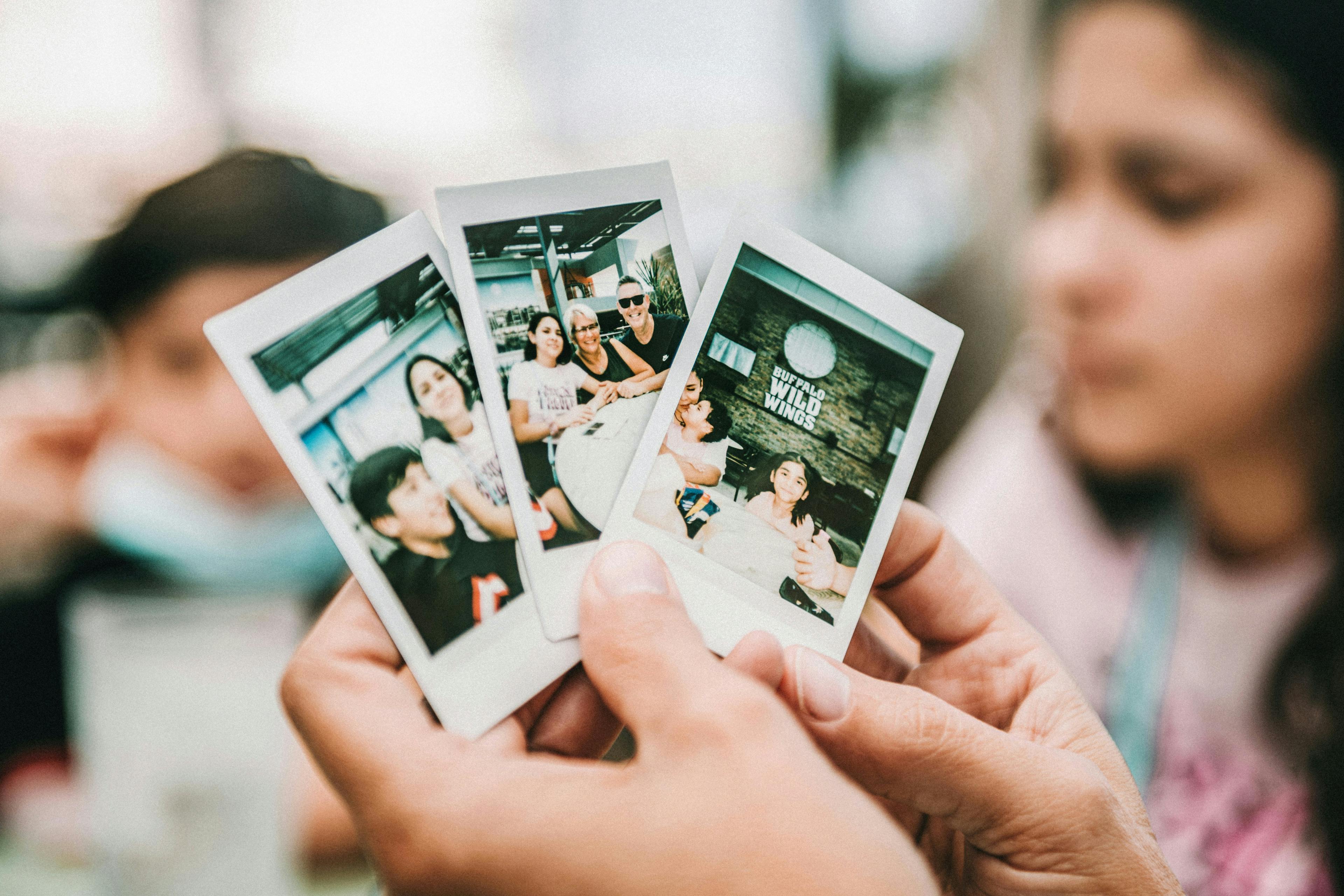 Comparing several polaroids, Photo by Tim Mossholder on Unsplash