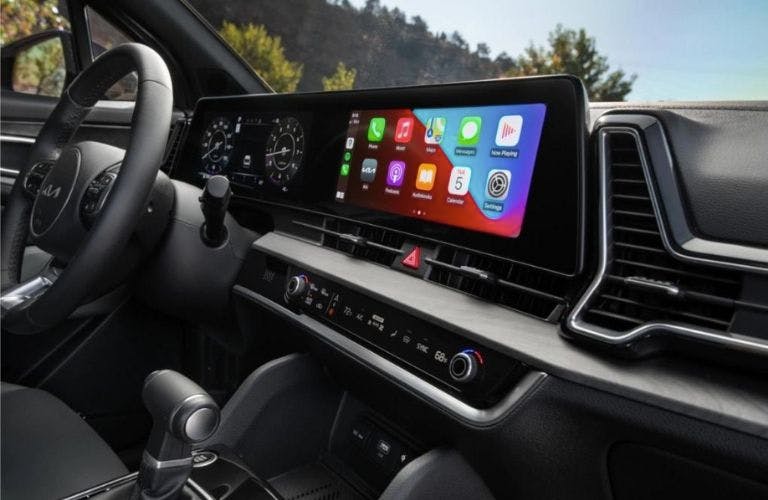 a car dashboard with a large screen