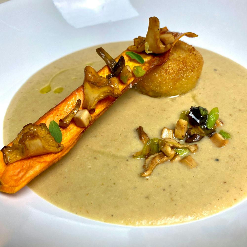 Chanterelles soup, mushrooms croquette and crispy sweet potato
