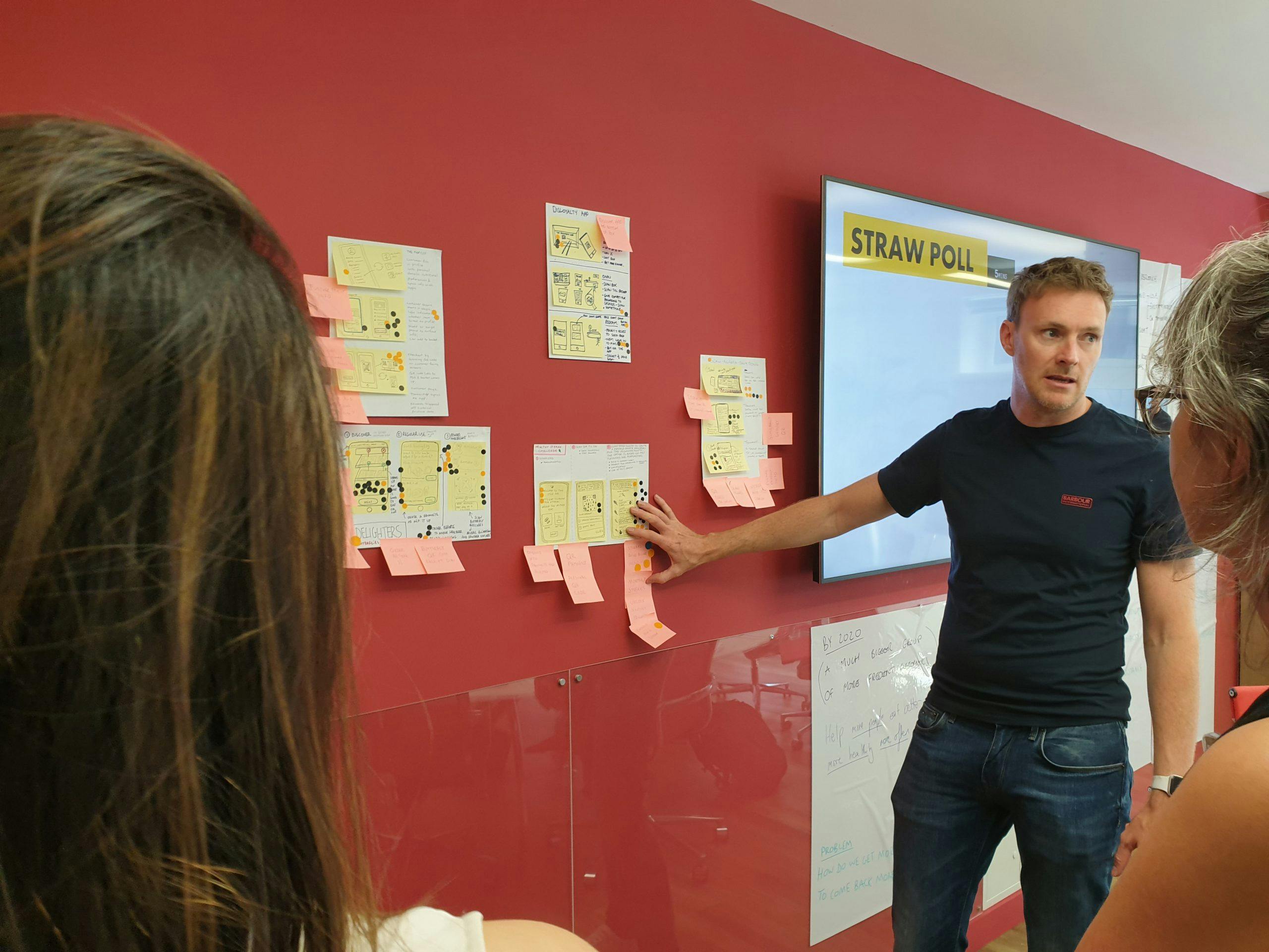 Chelsea Apps CEO discussing a wireframe for an app