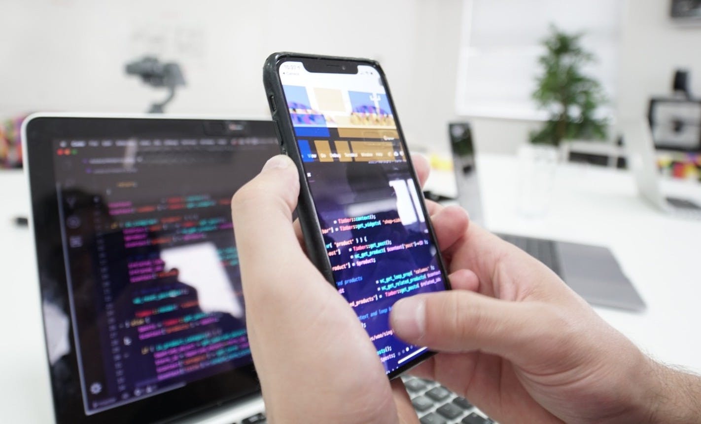 An app developer coding a mobile app