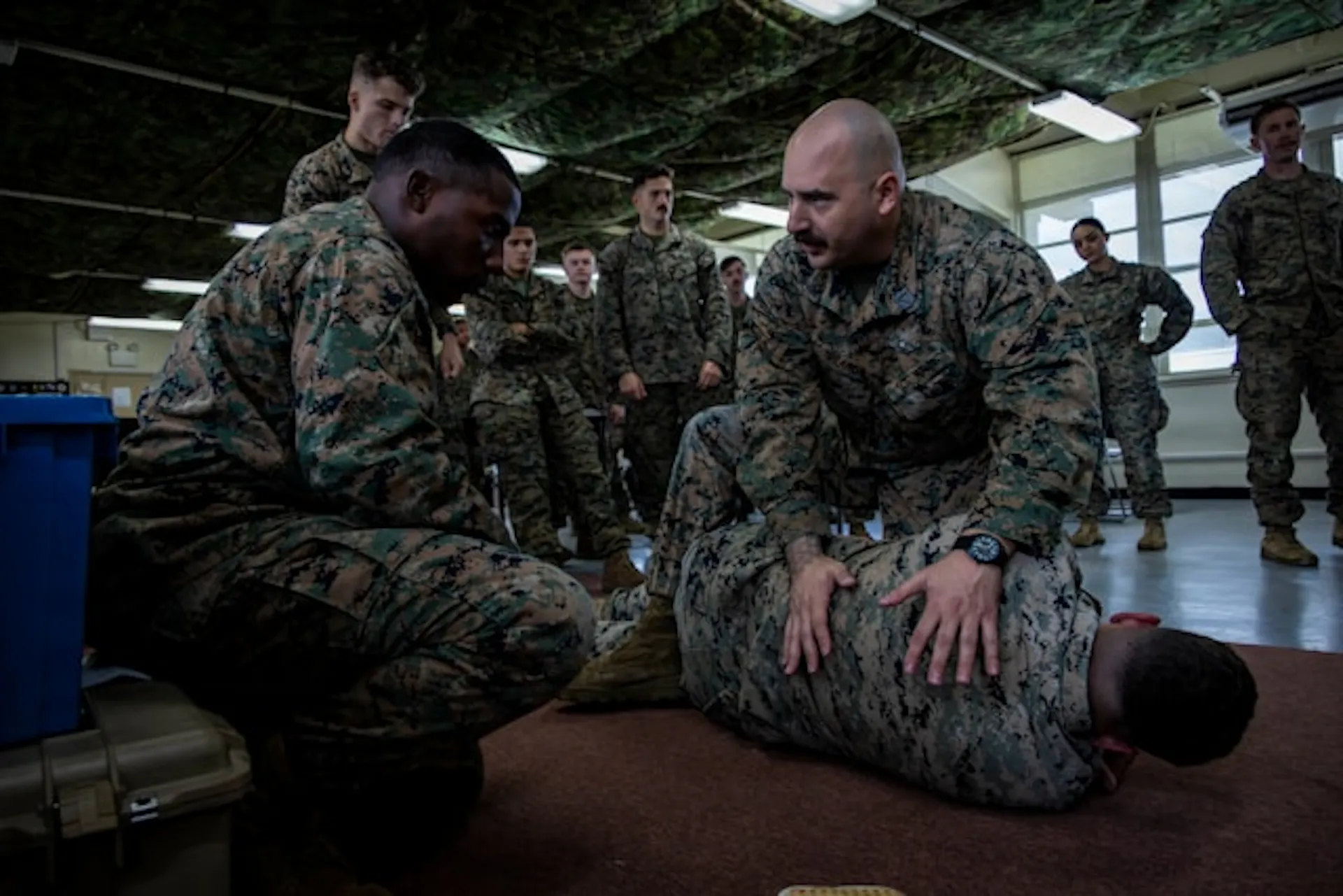 Service members training Photo by Navy Medicine on Unsplash