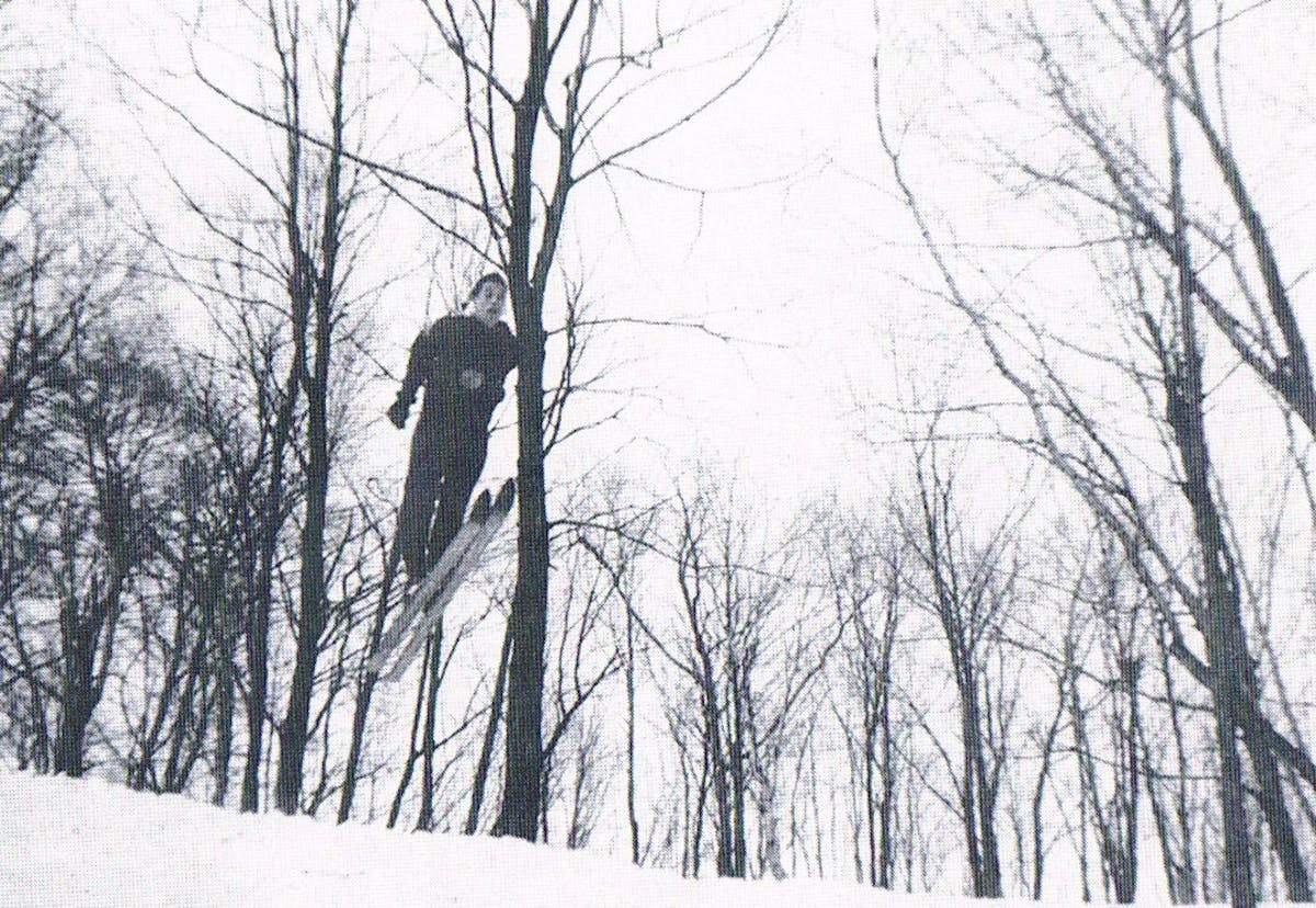 Chicopee - 1950-1959 - image of man on ski's jumping