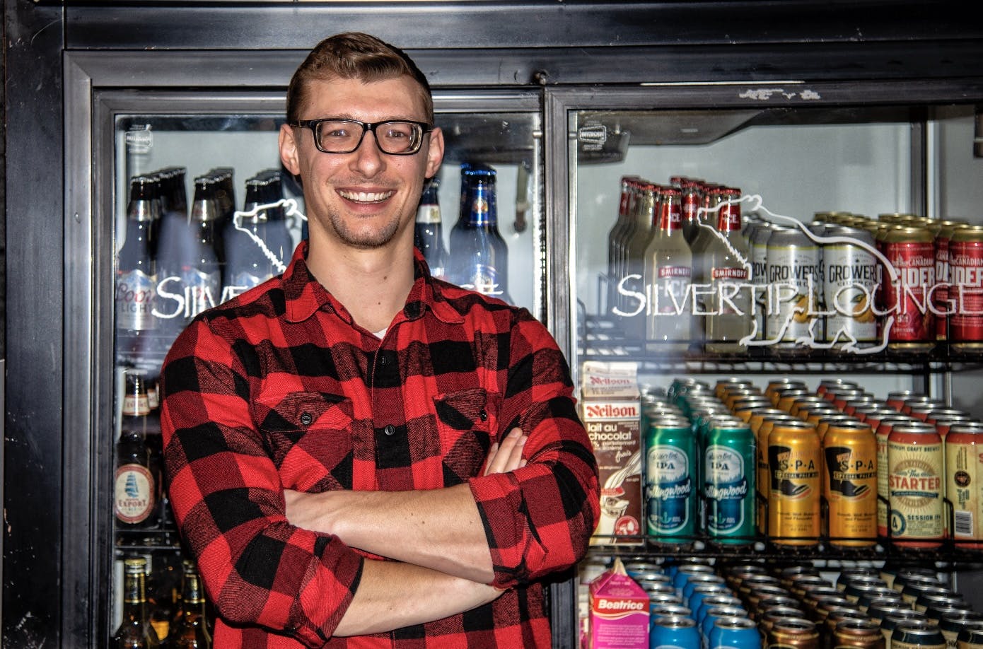 Silvertip Lounge Chef posing in front of fridge