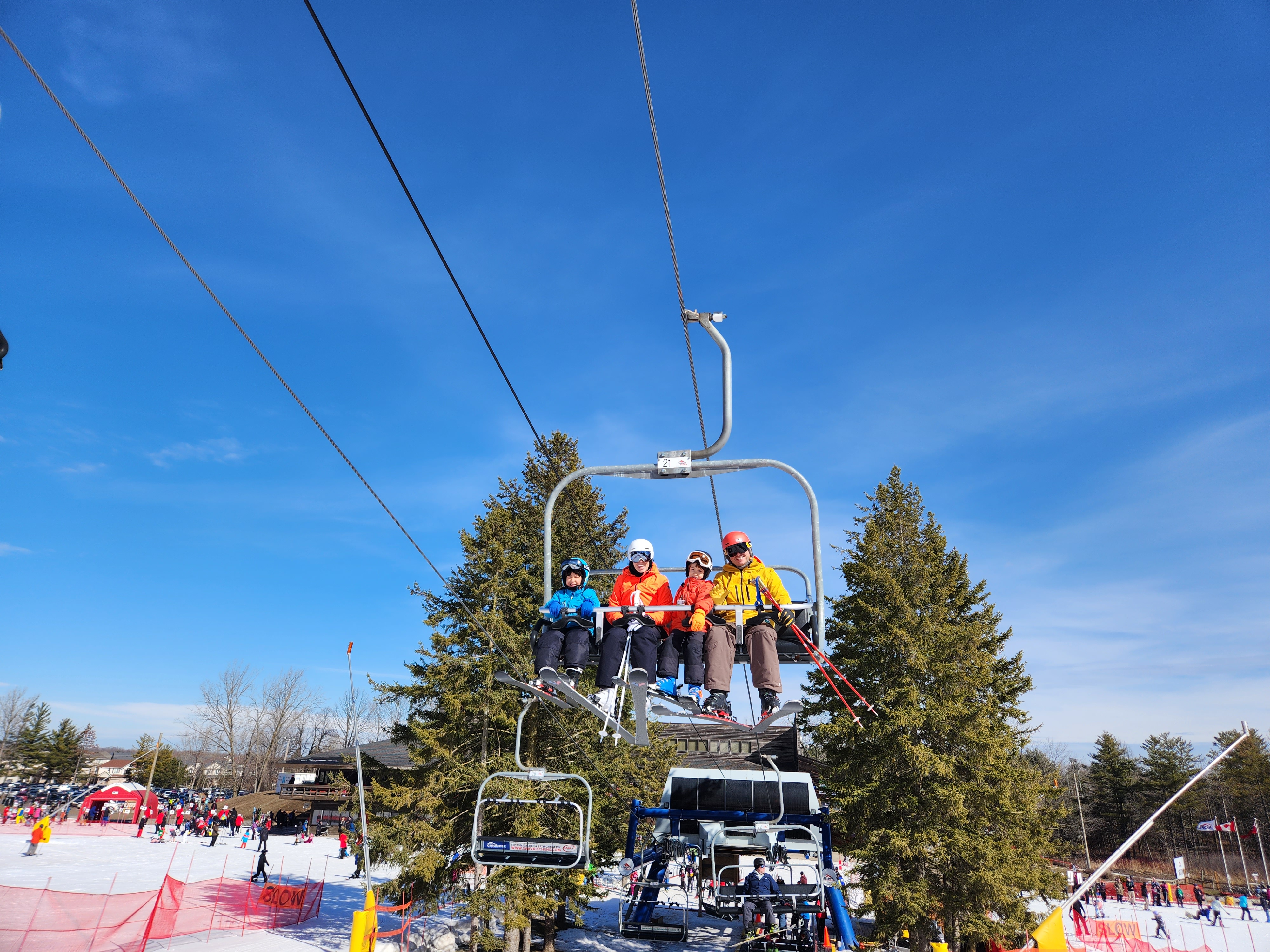 North chair with a family.