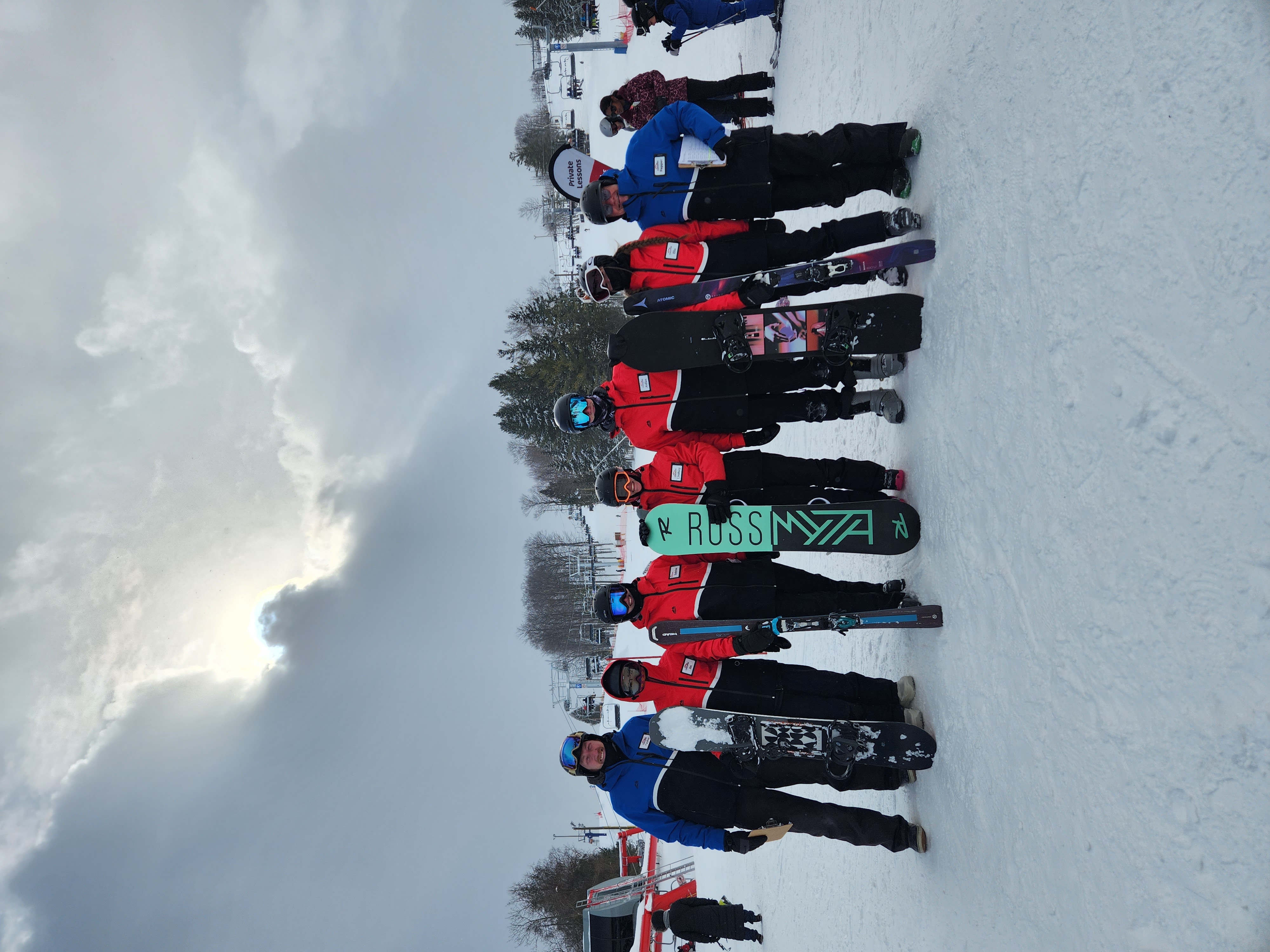 Instructors at base of hill together