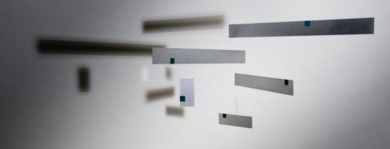 One of Bruno Munari's alluminium 'Useless Machines' casting an amazing refelction