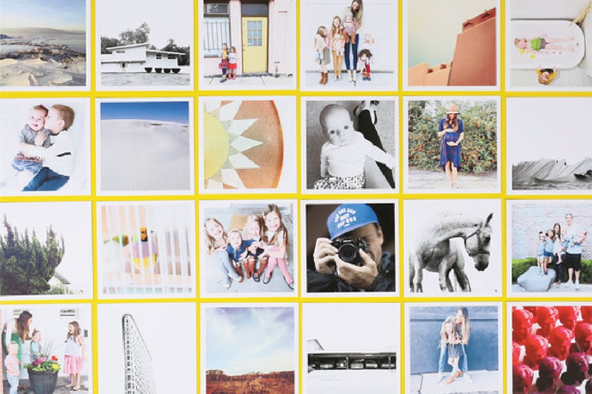 Photo prints displayed on a wall