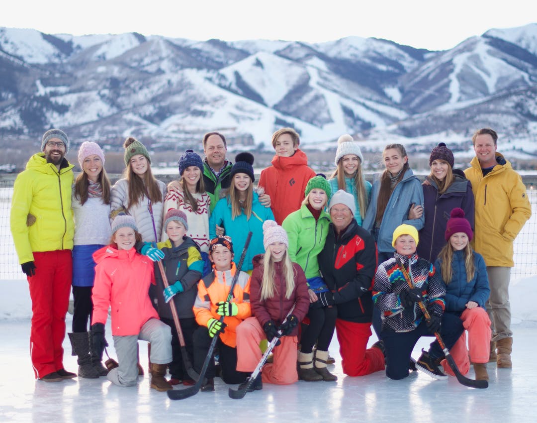 Family picture with snowy mountains