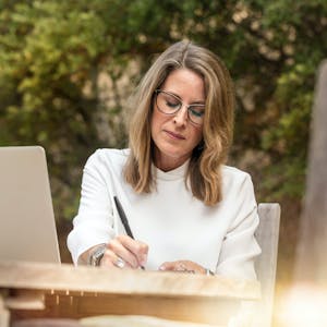Woman writing a note