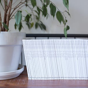 Chatbooks monthly series on display in a home