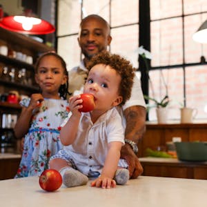 kids in kitchen with fruit