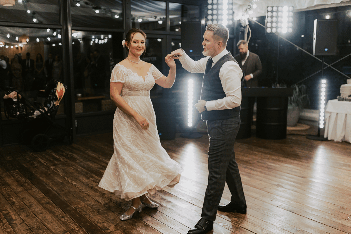 A man dances with a woman.