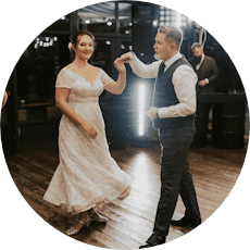 A man dances with a woman.