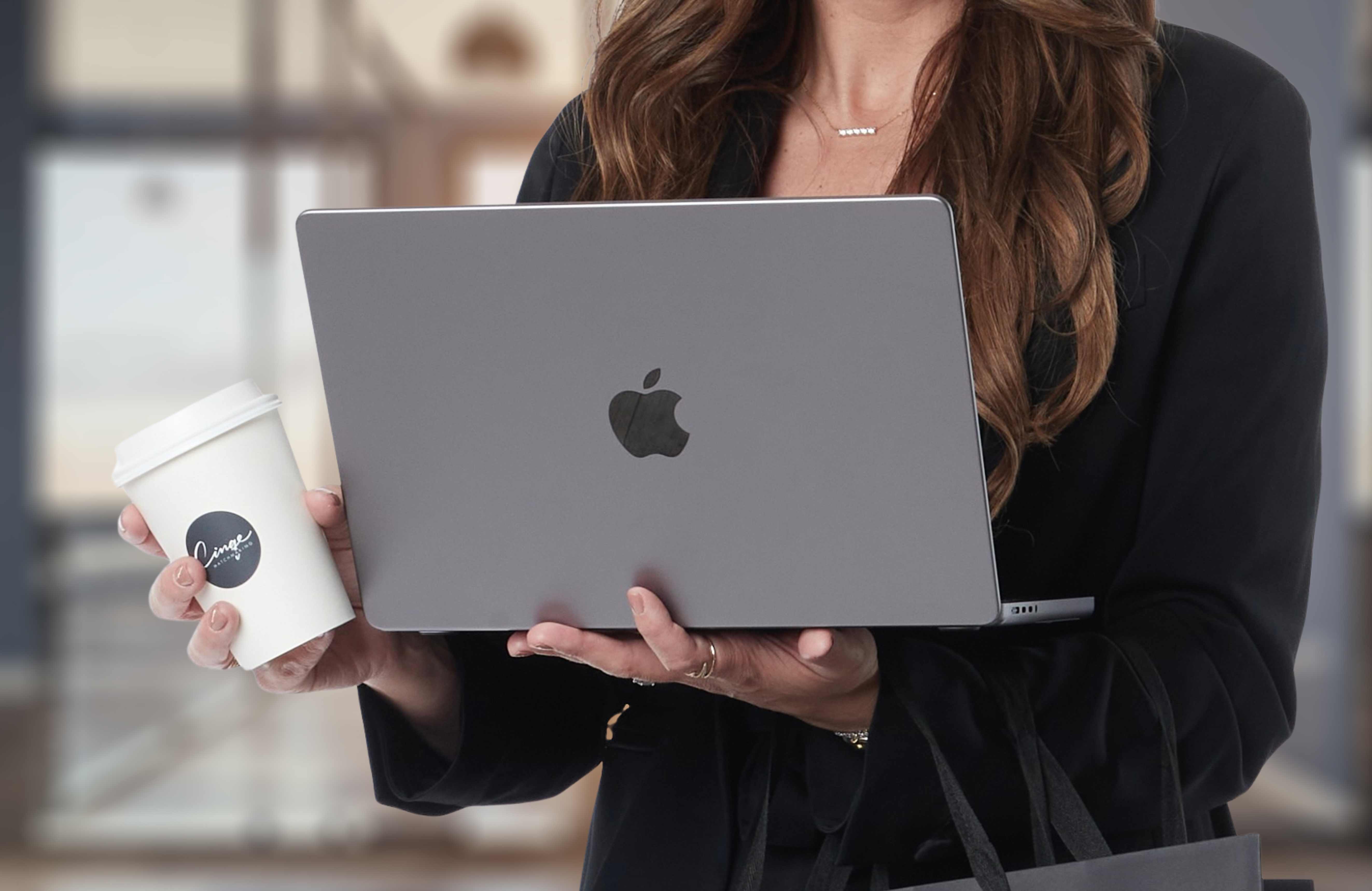 computer and coffee with cinqe coffee cup