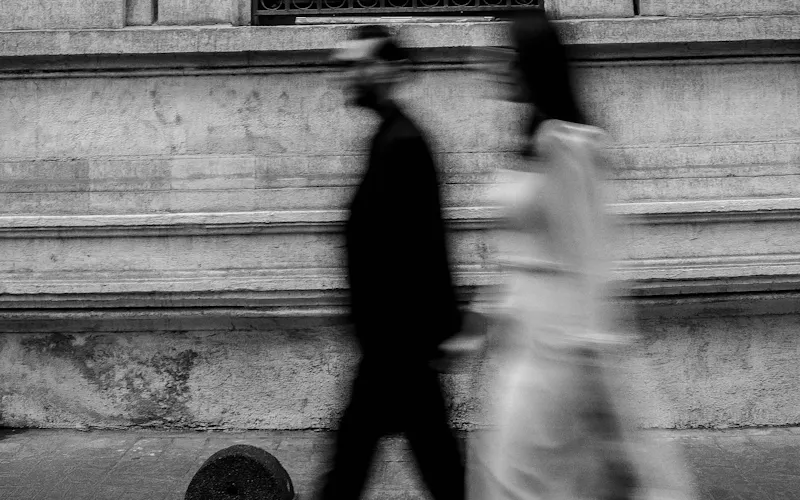 couple walking blurry
