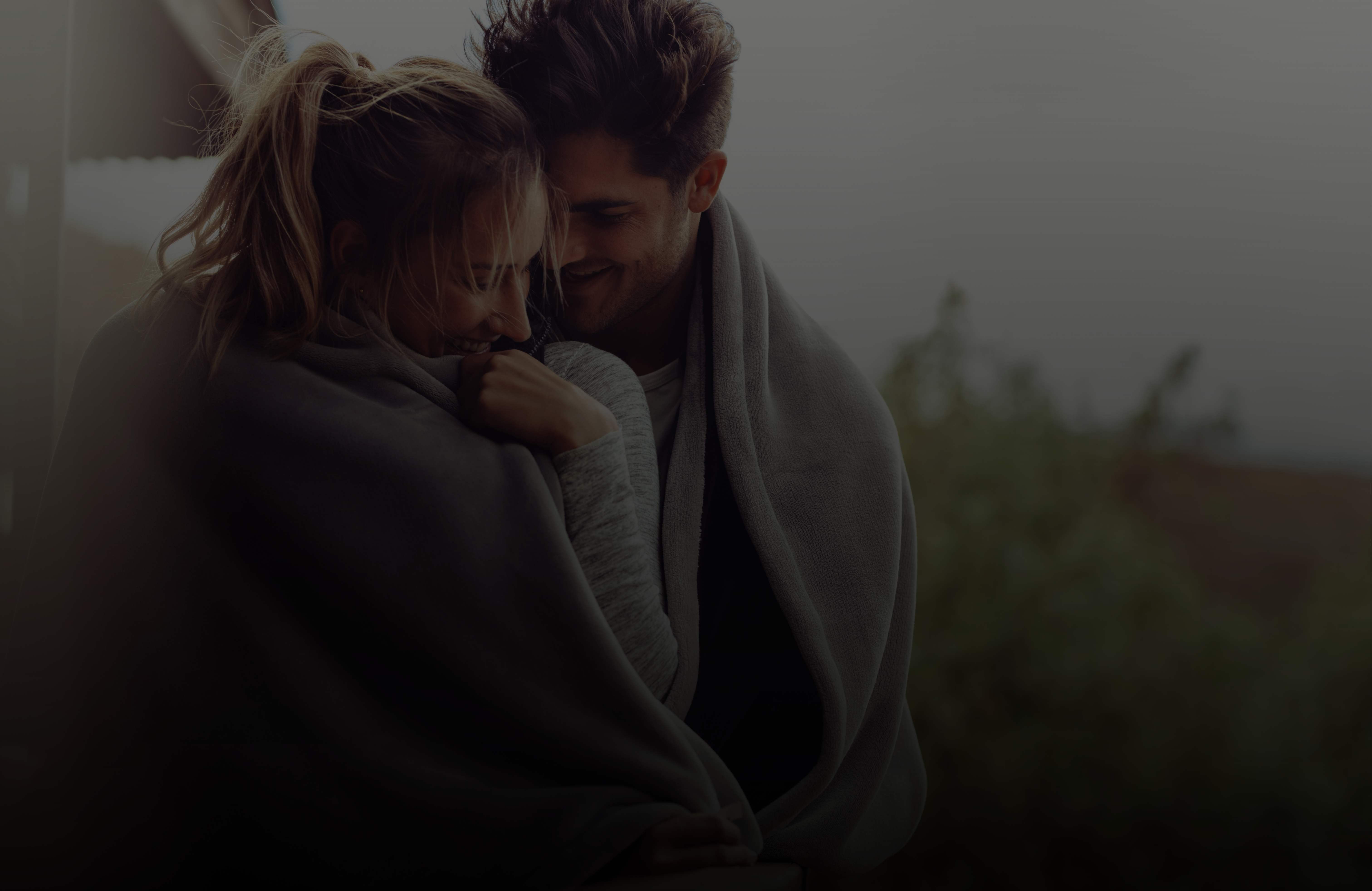 couple smiling cold outside 