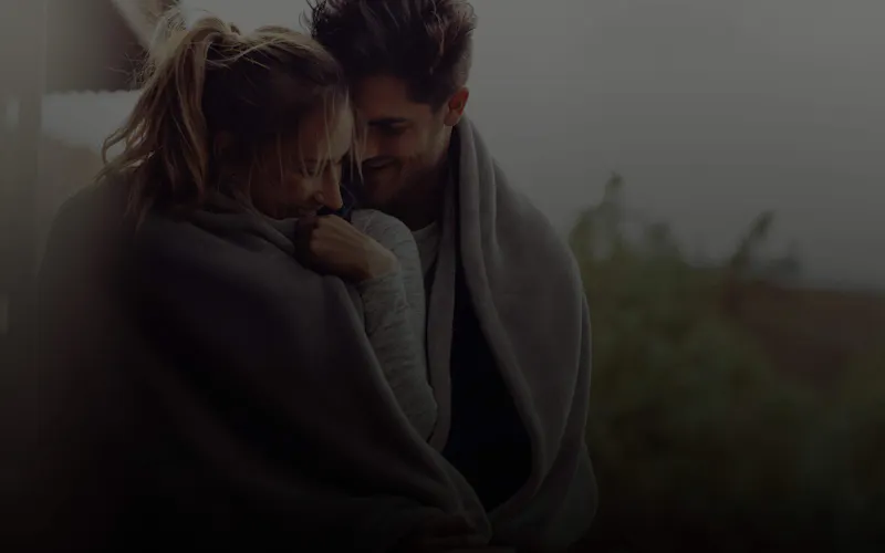 couple smiling cold outside