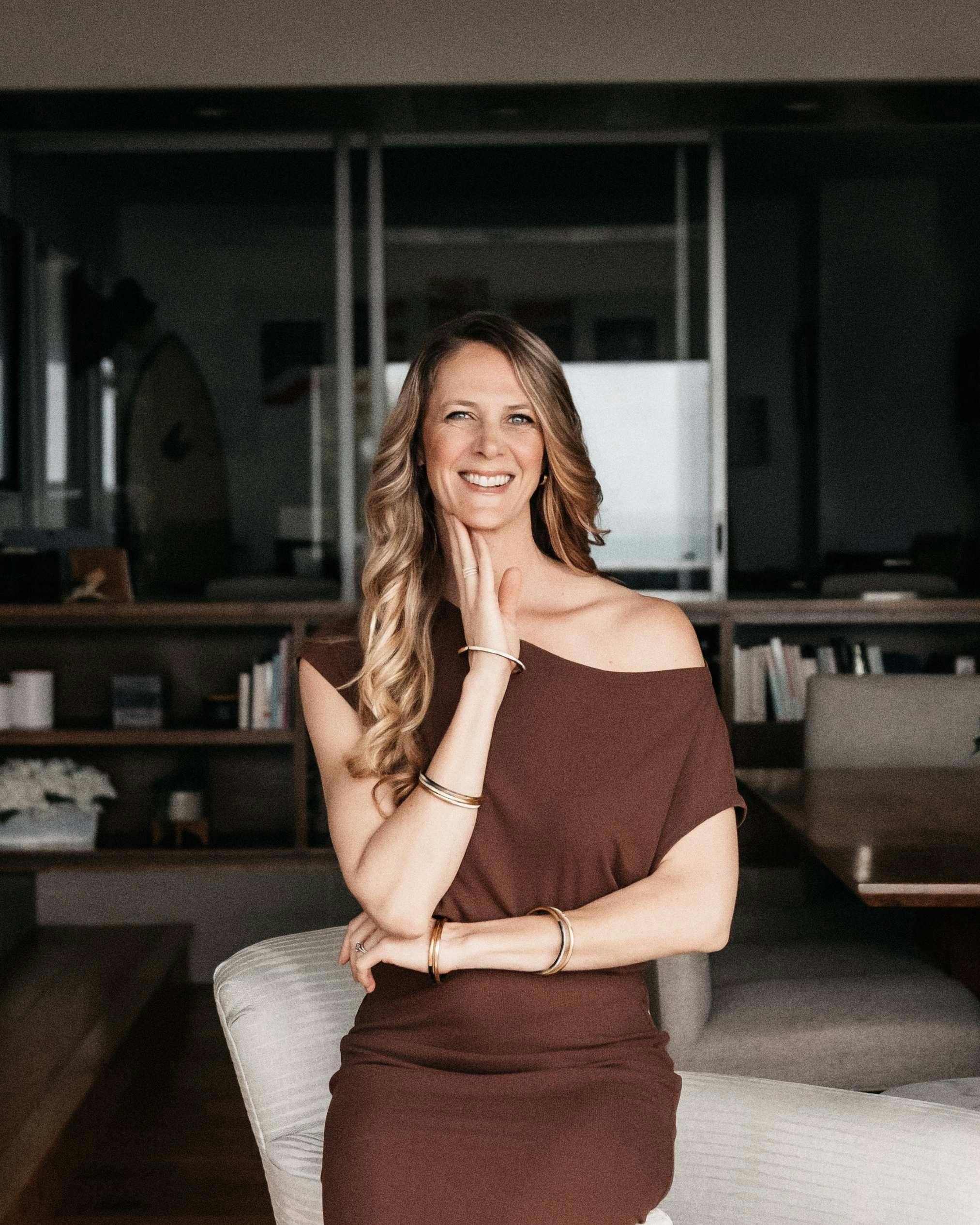 Andrea Miller matchmaker in brown 