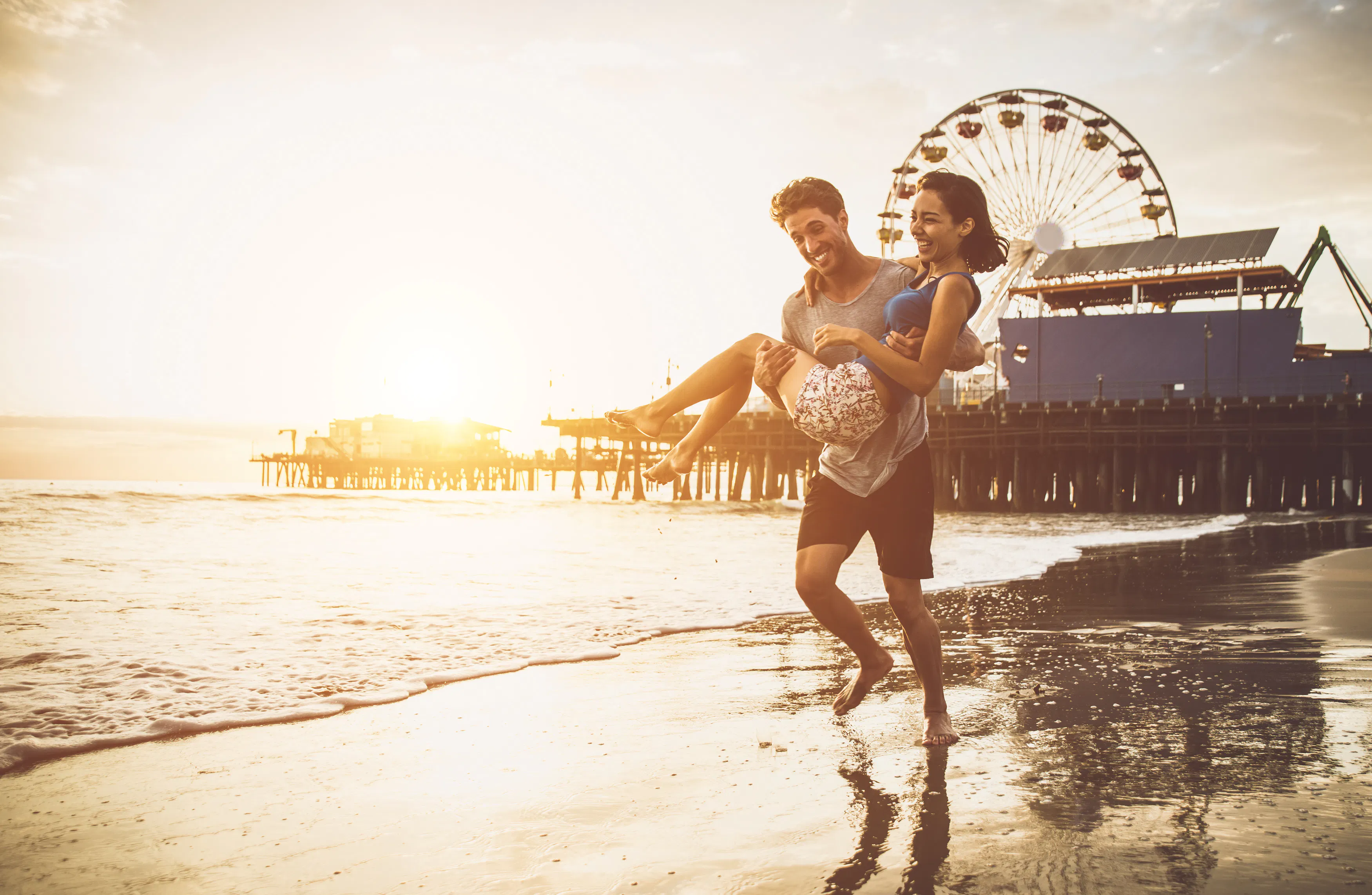 Couple in love spending time on the beach in santa monica, los angeles