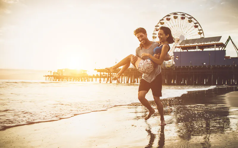 Couple in love spending time on the beach in santa monica, los angeles