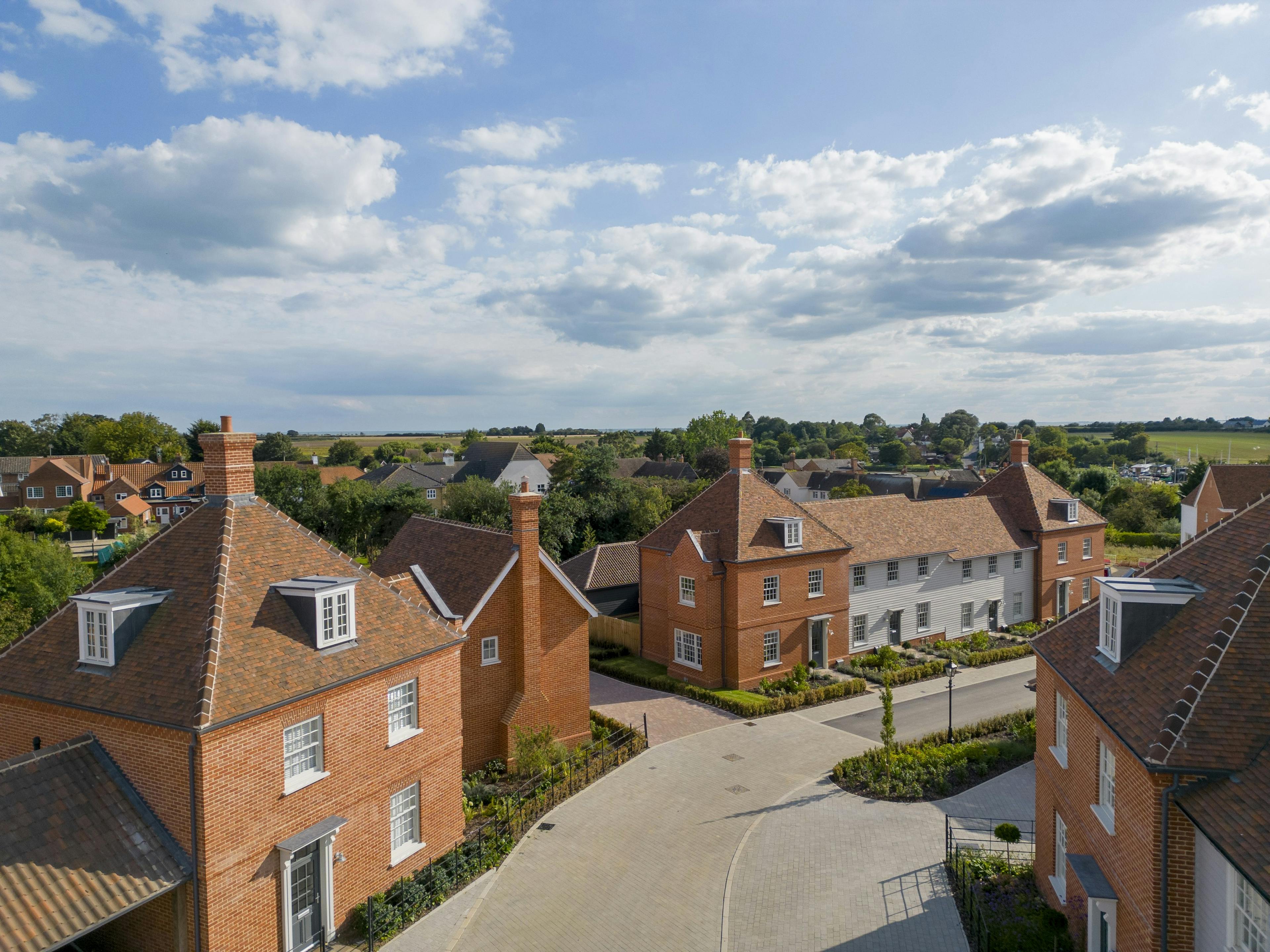 Caption: an aerial view of a residential area with houses