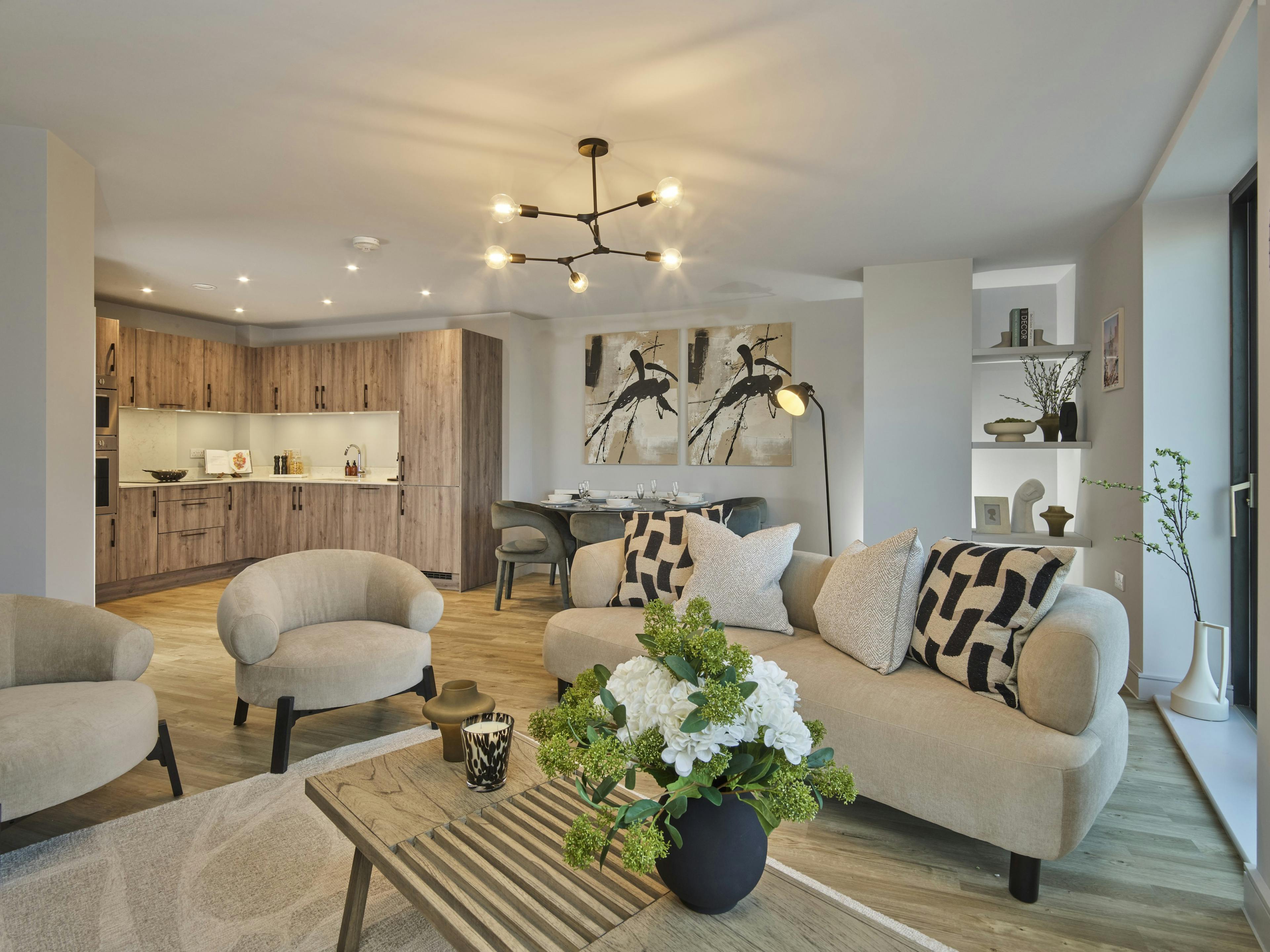 An open plan kitchen/living area in a modern appartment