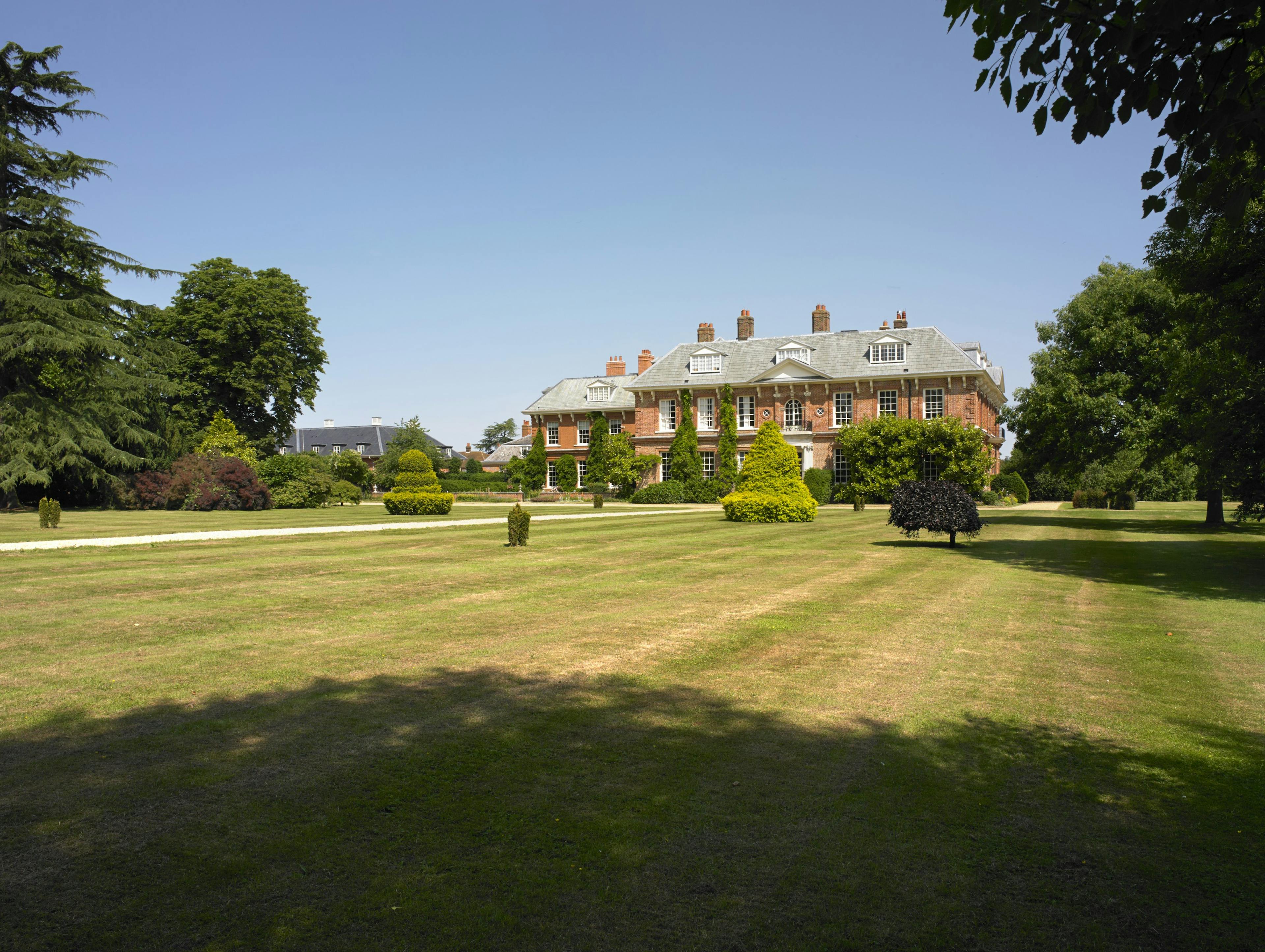 A refurbished stately home and lawns