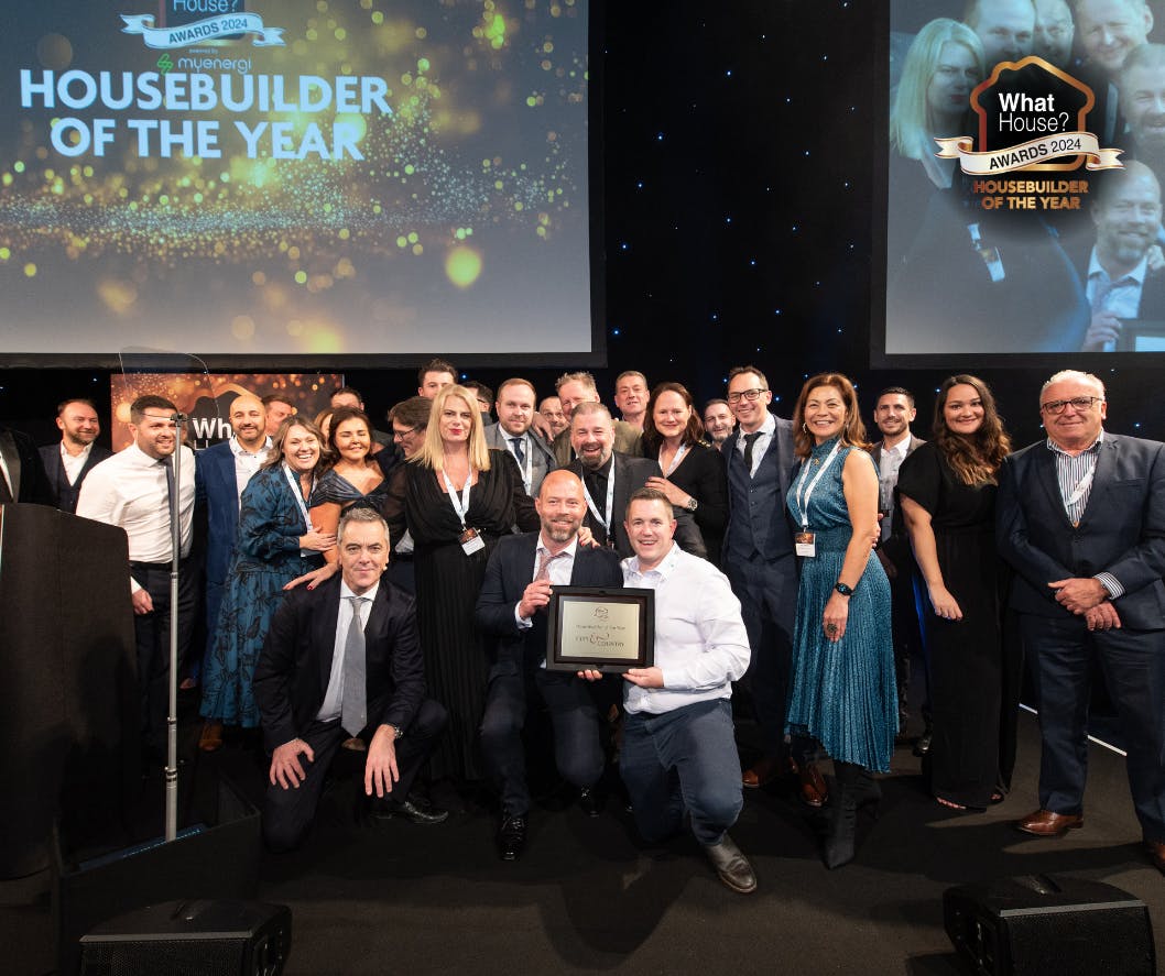 The City & Country team on stage collecting the House Builder of the Year award.
