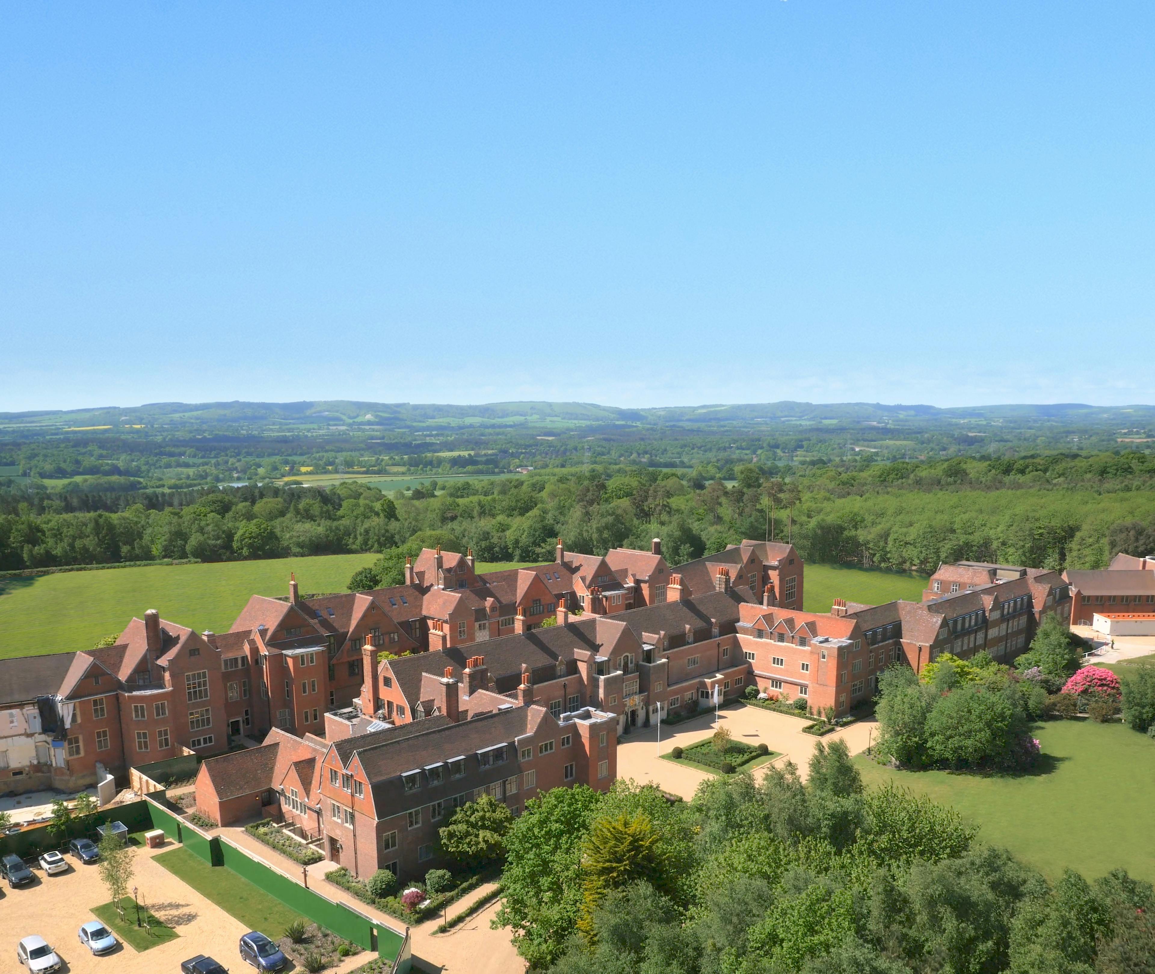 Caption: an aerial view of a large brick building