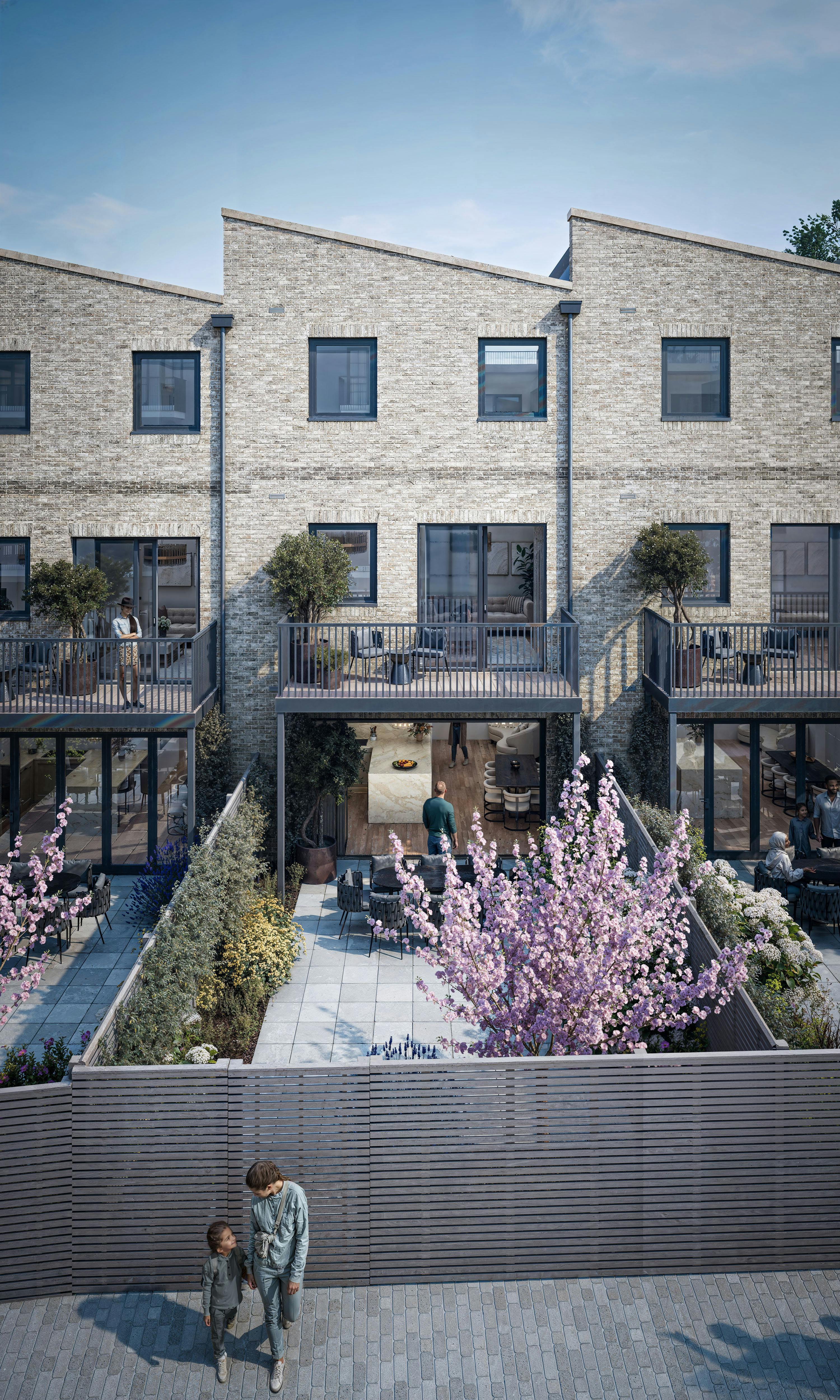 Caption: a couple of people standing in front of a building