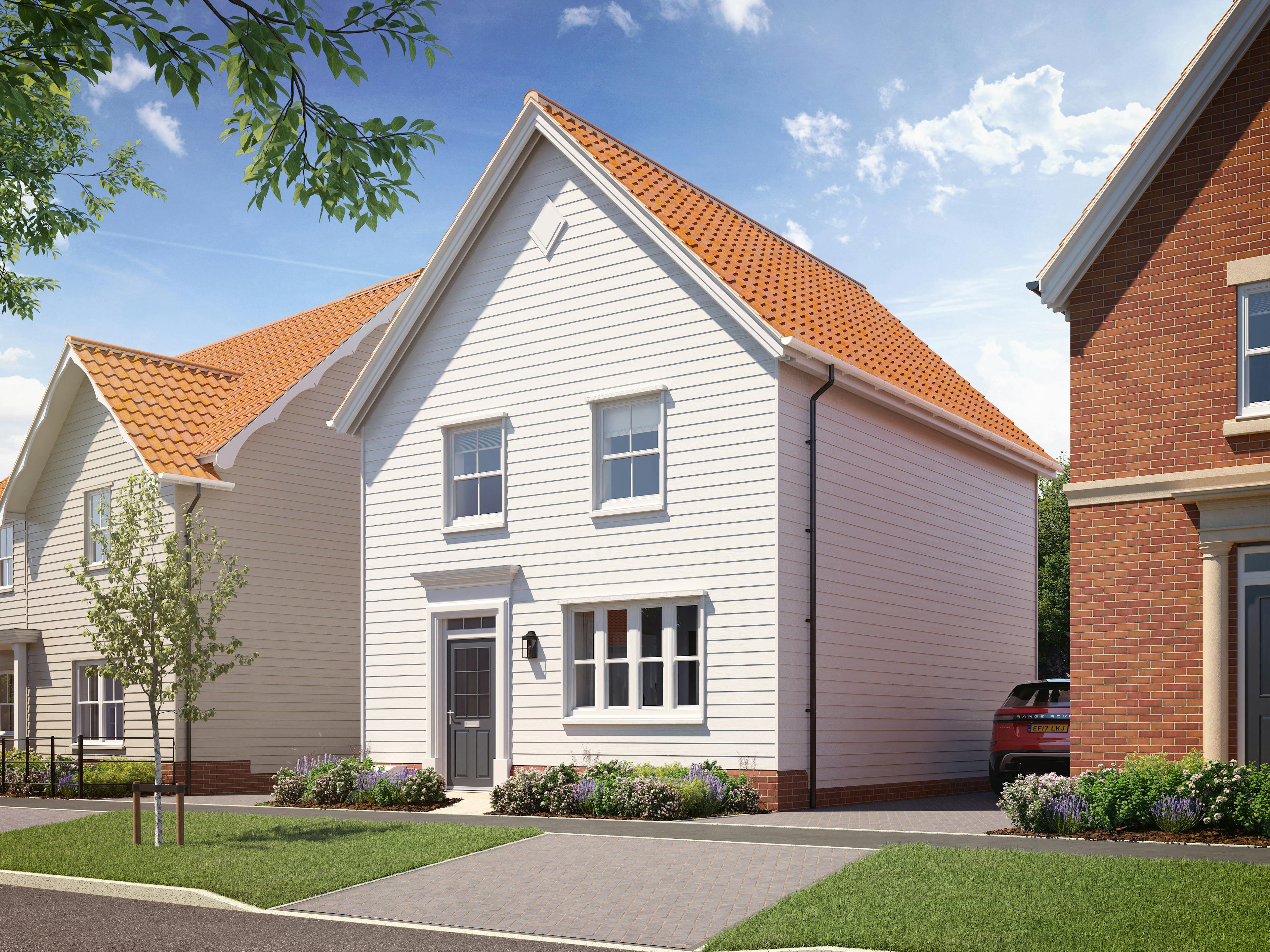 Caption: a row of white houses with a red tiled roof