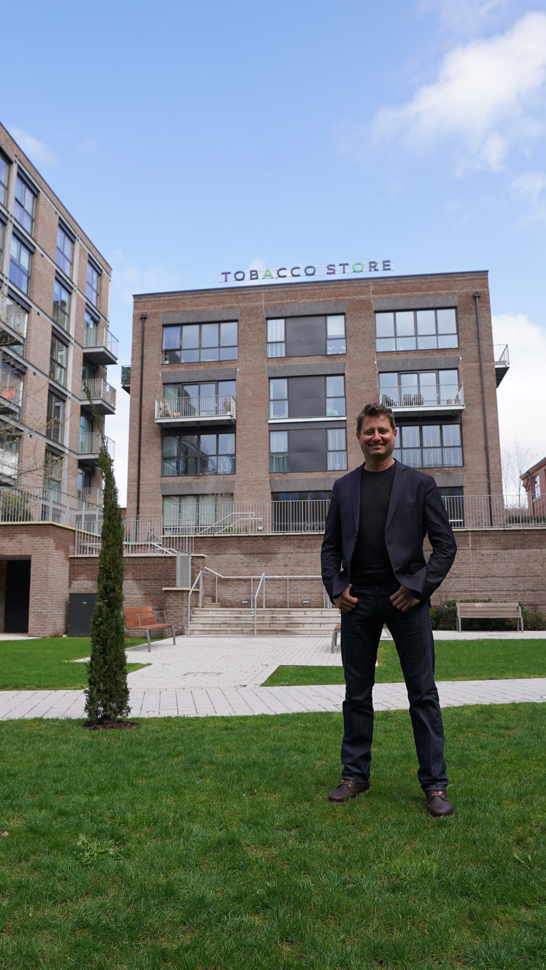 George Clarke standing in front of Factory No.1 Bristol