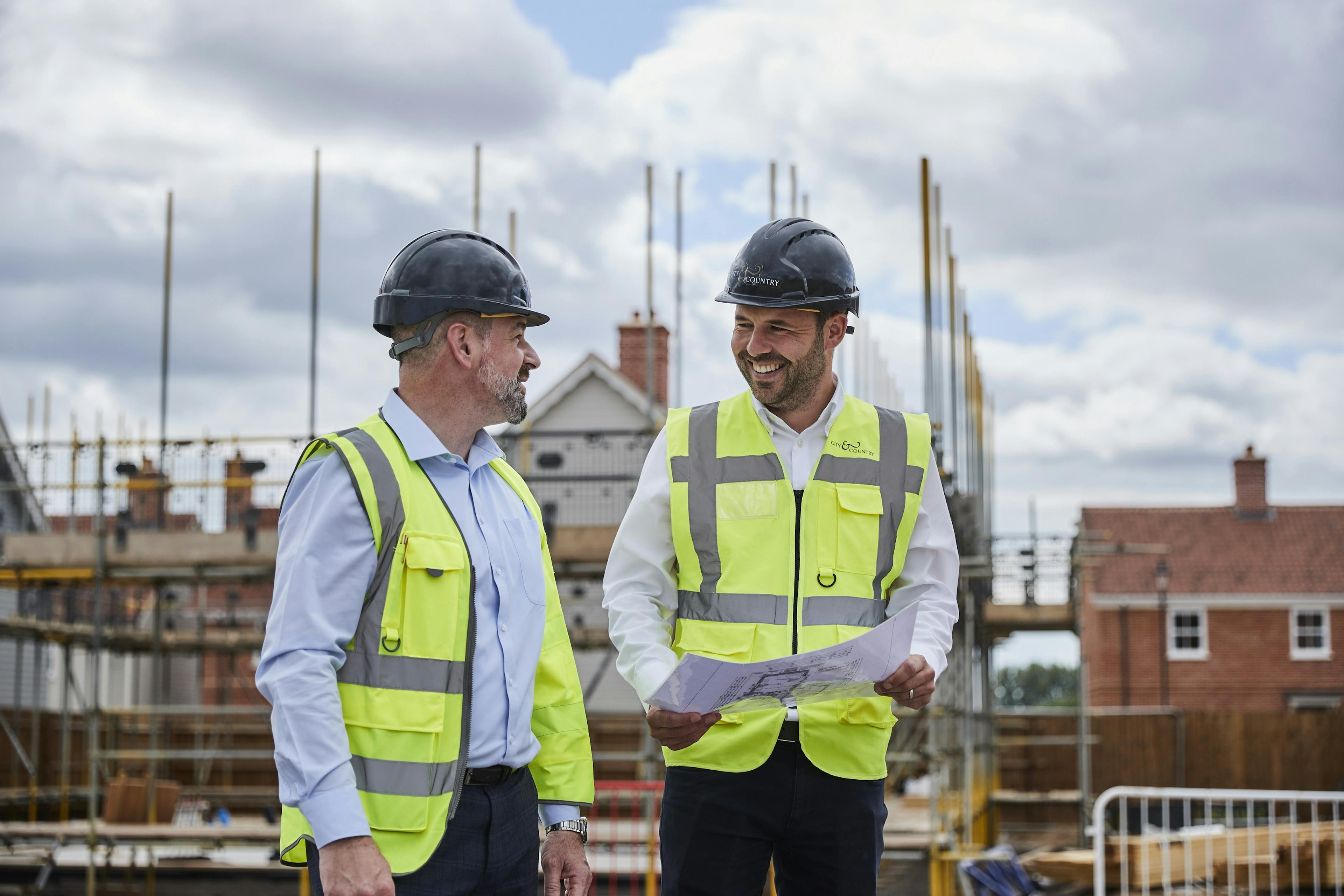 Men in high visibility vests on a construction site