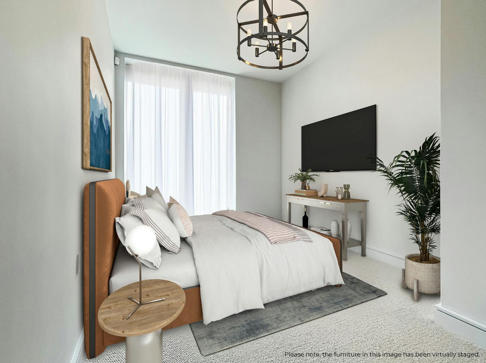 Caption: a bedroom with a large bed and a flat screen tv