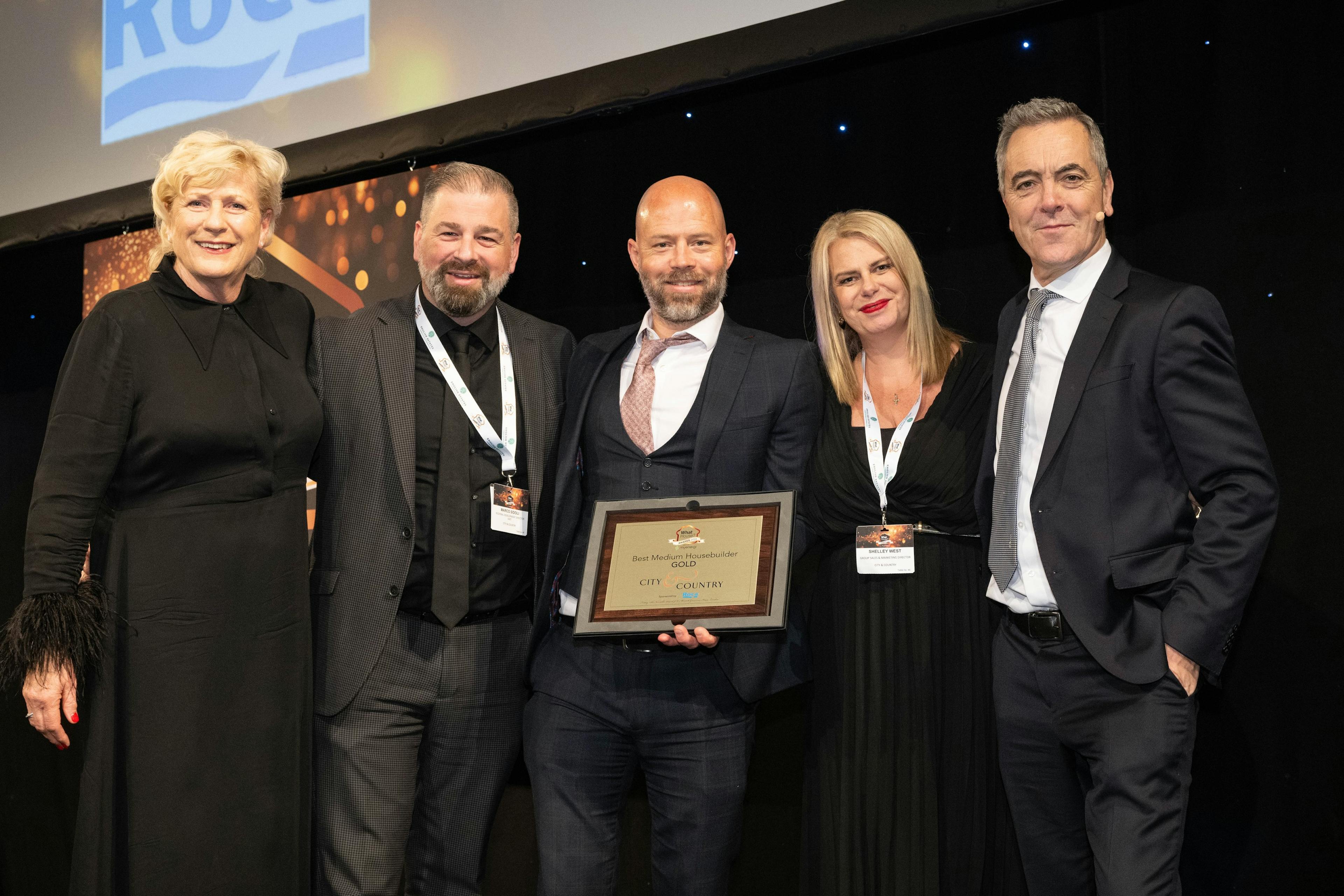 Caption: a group of people standing next to each other