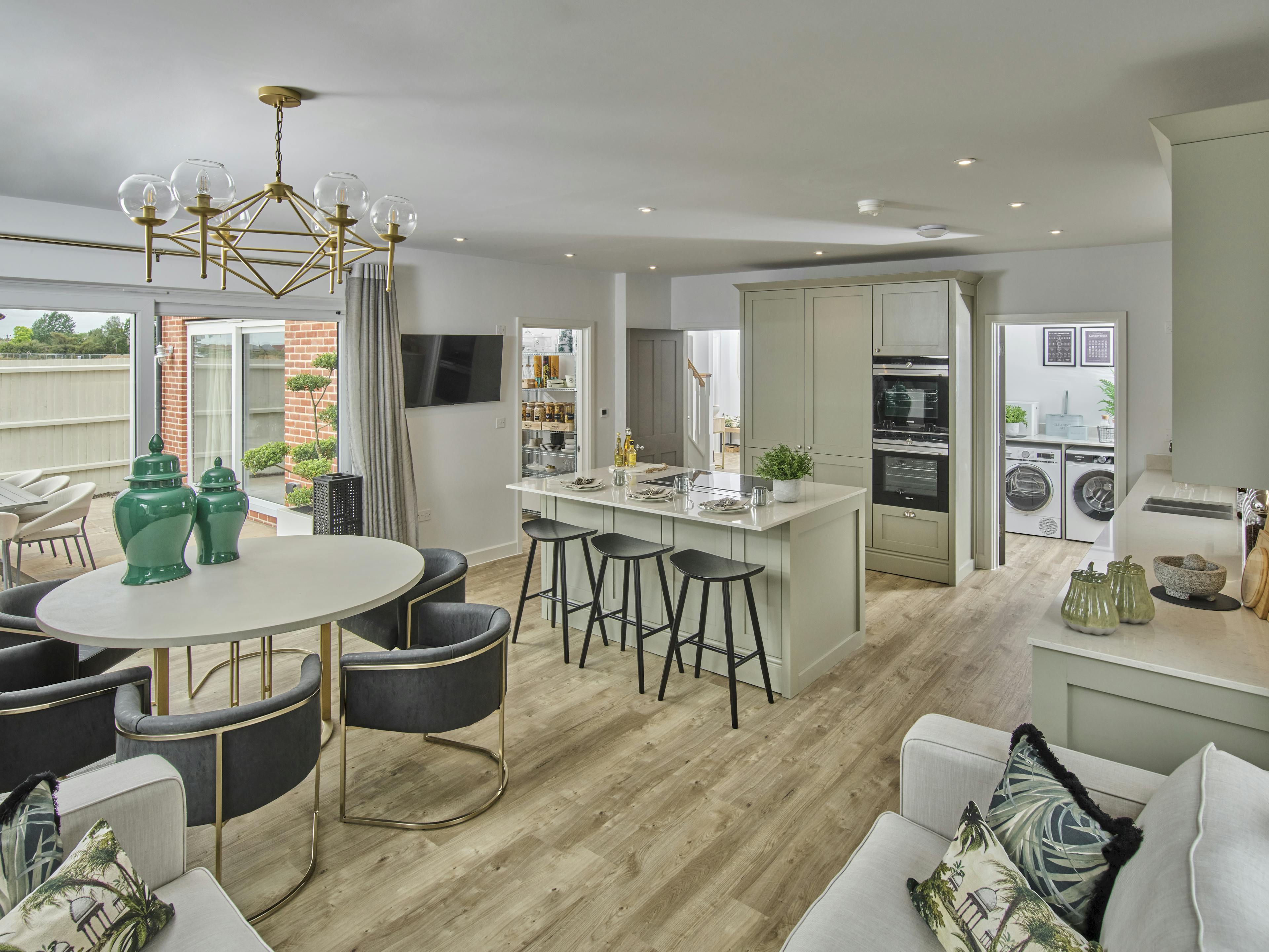 Caption: a large open concept kitchen and living room