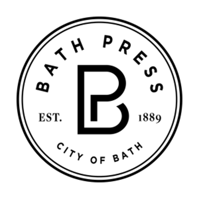 Caption: a black and white photo of a bath logo