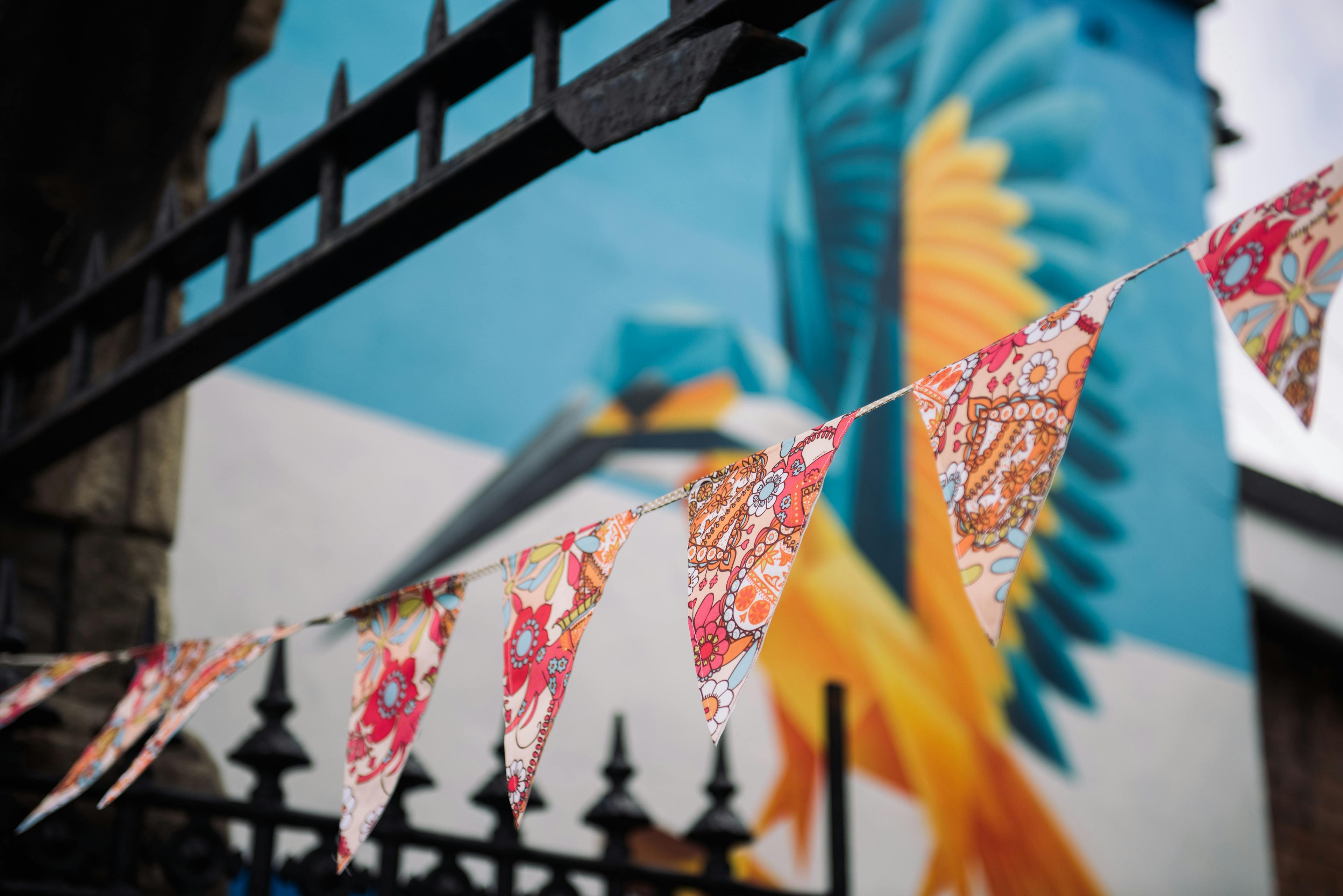 Caption: a picture of a bird on a fence