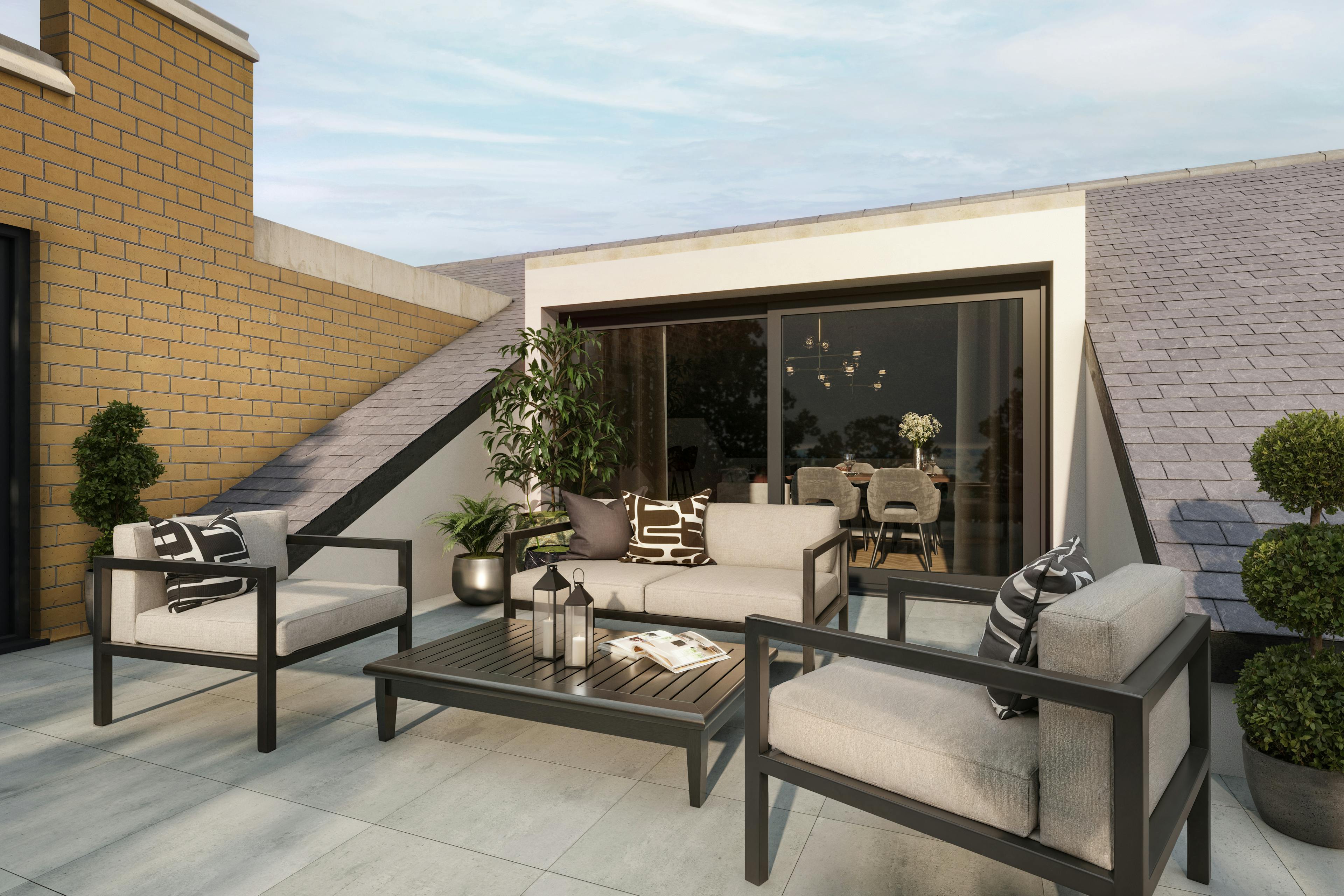 Caption: a patio with a couch, chairs, table and potted plants