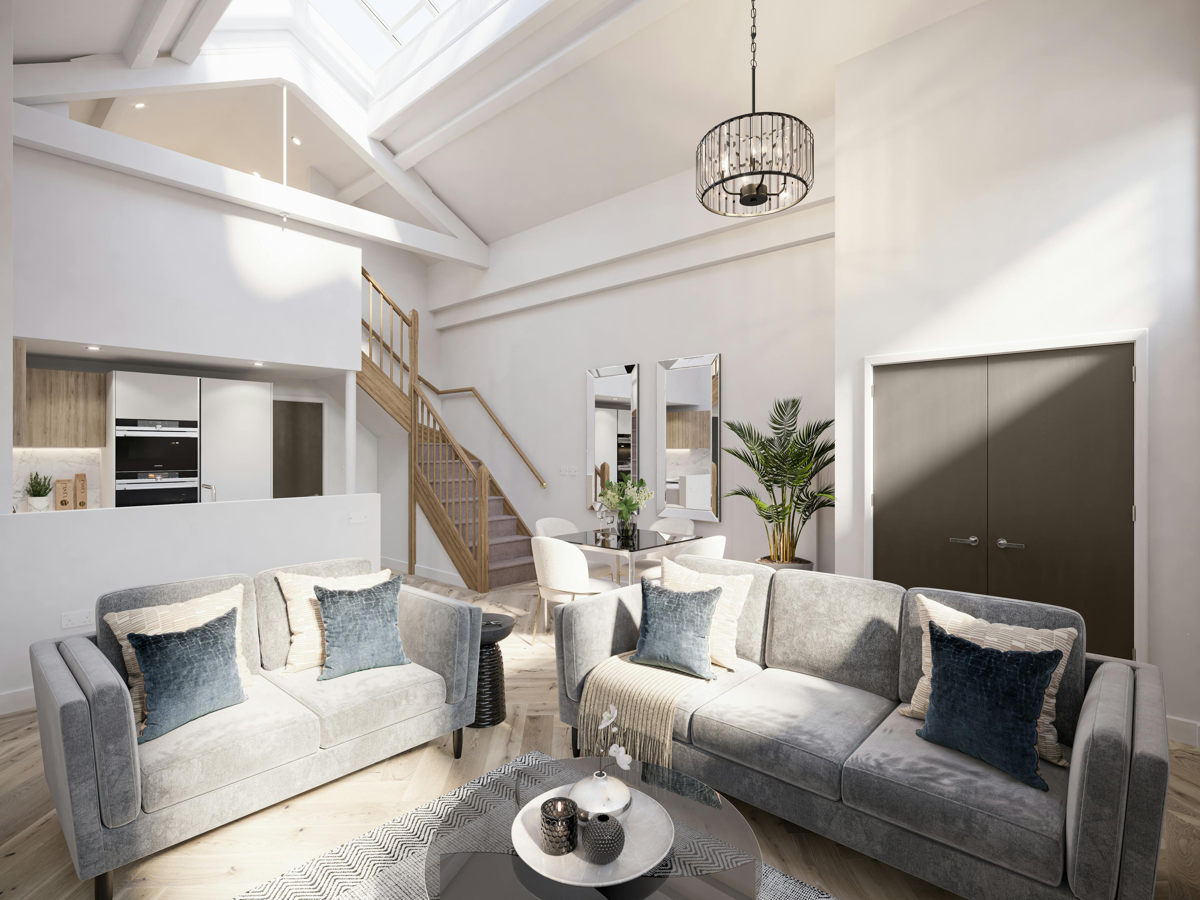 Caption: a living room filled with furniture and a stair case